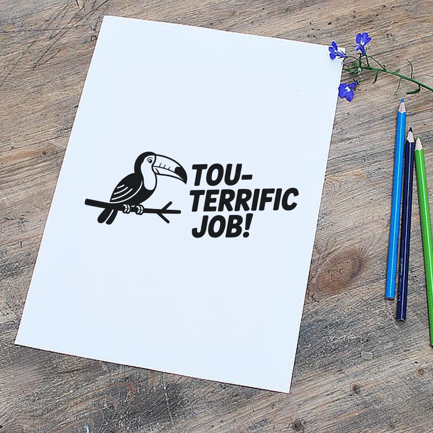 Toucan Tou-terrific Job! rubber stamp impression on white paper, perfect for praise, encouragement, and handmade cards.