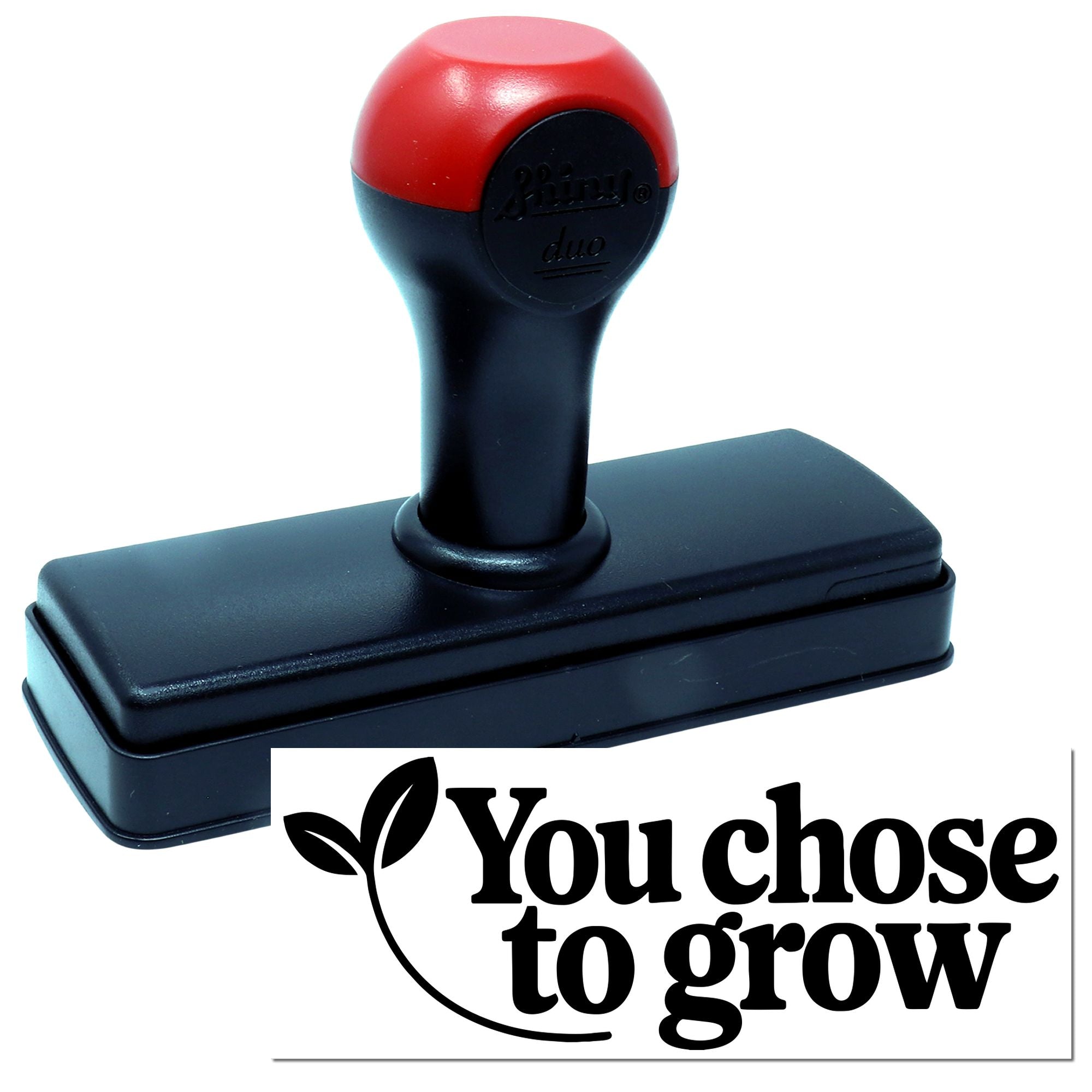 Custom self-inking rubber stamp with You choose to grow imprint for business branding and promotional use.