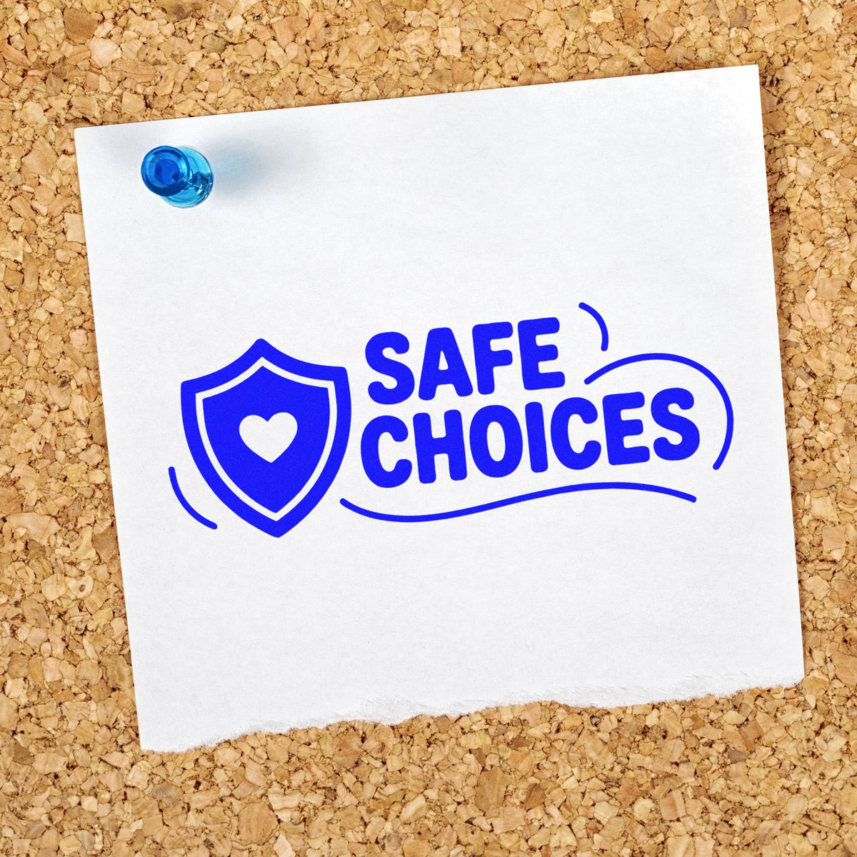 Blue Safe Choices rubber stamp with shield and heart icon pinned to paper on a corkboard, promoting safety messaging.