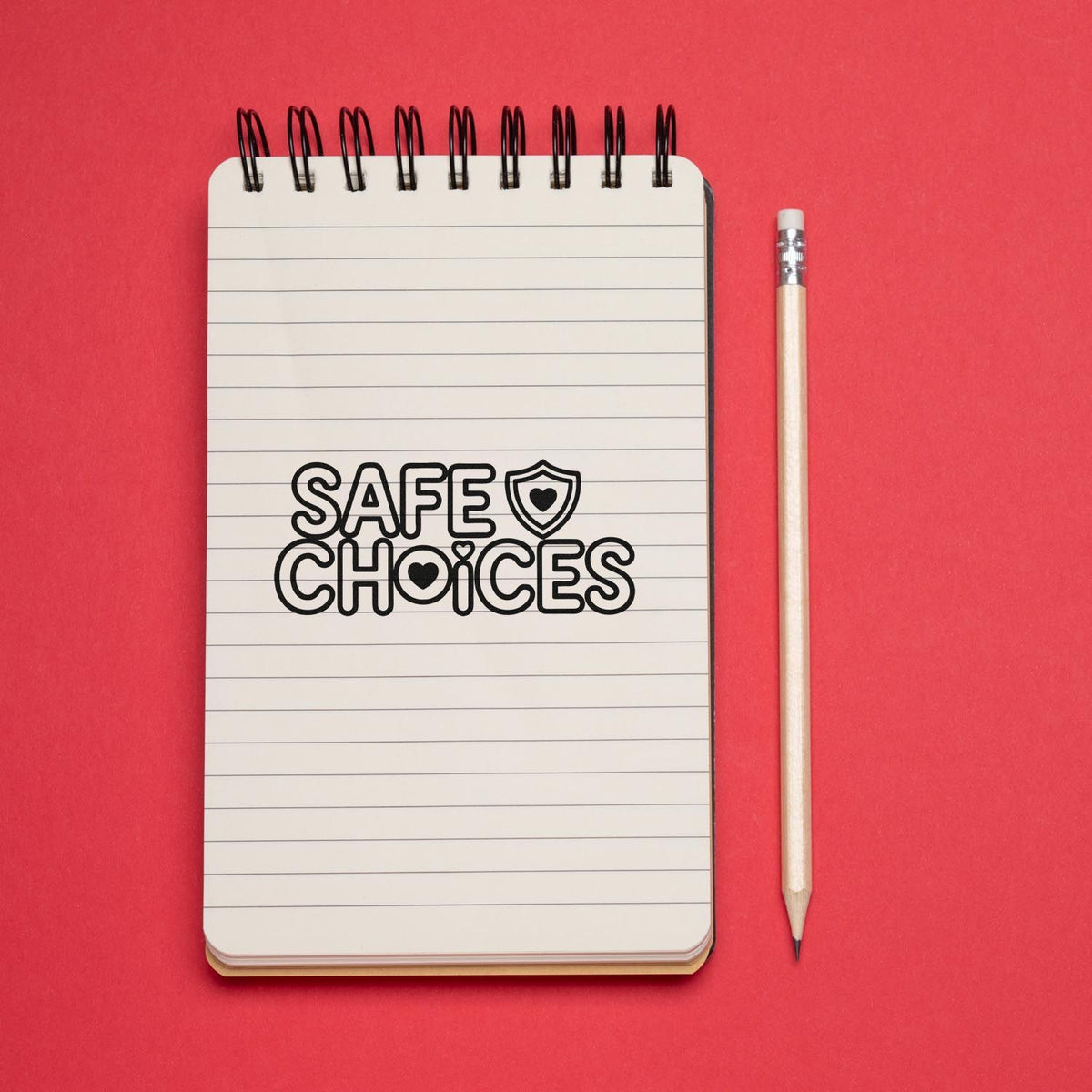 Safe Choices rubber stamp design on lined notebook with pencil, ideal for classroom behavior rewards and school supplies.