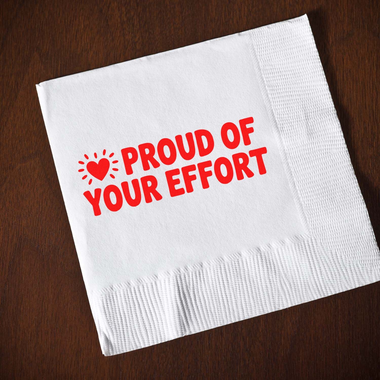 Motivational rubber stamp imprint reading Proud of Your Effort with heart icon, ideal for teacher or business rewards.