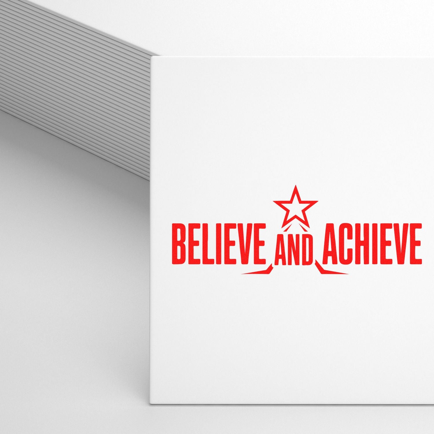 Red Believe and Achieve motivational rubber stamp design with star icon on a white square card.
