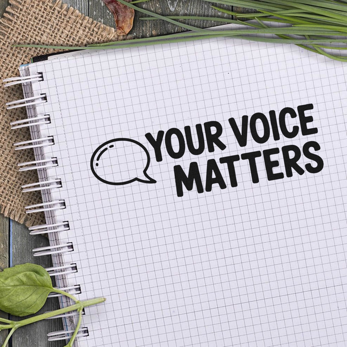Your Voice Matters rubber stamp design with speech bubble icon on notebook, ideal for advocacy and awareness messaging.