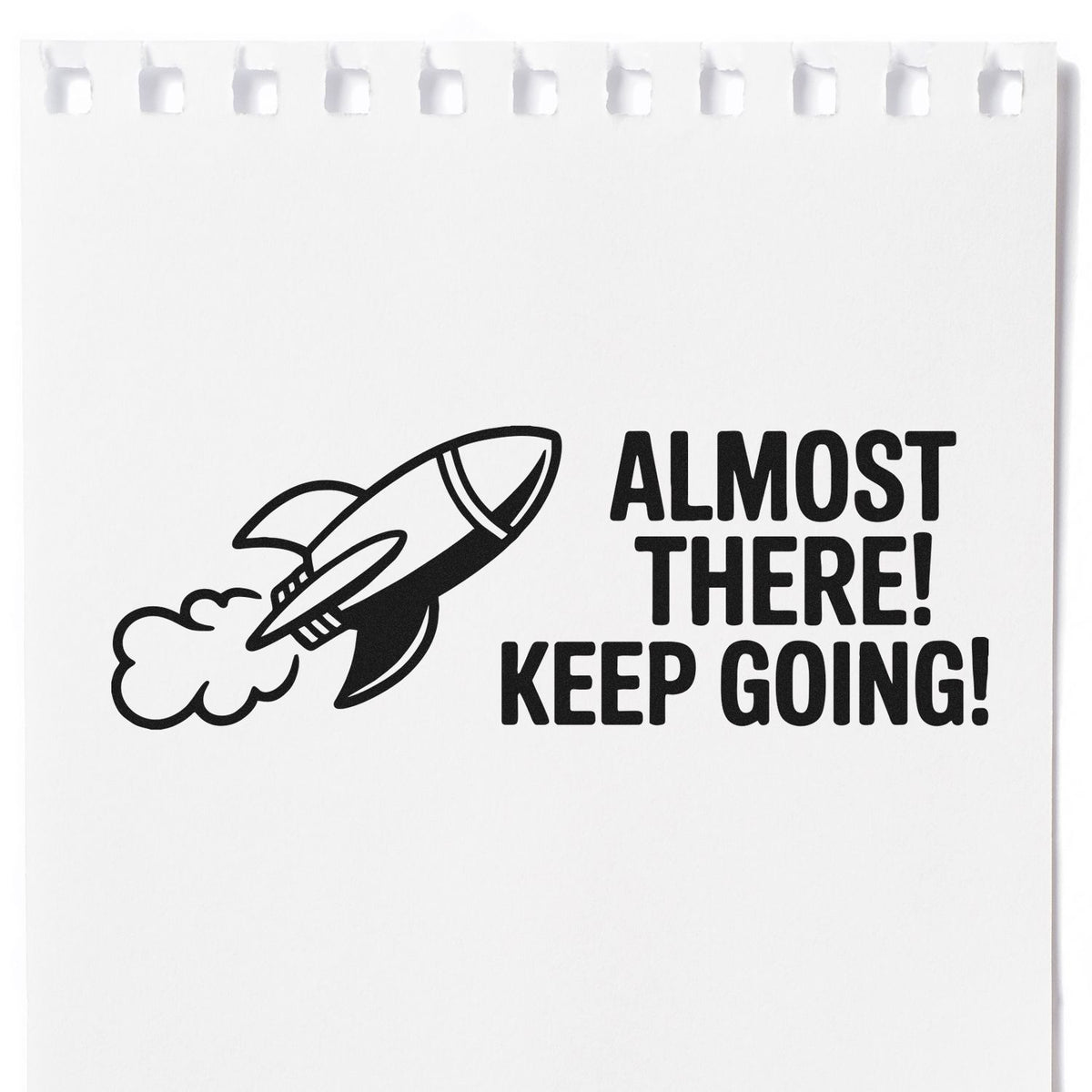 Motivational rubber stamp with rocket and Almost There! Keep Going! for encouragement and progress tracking.