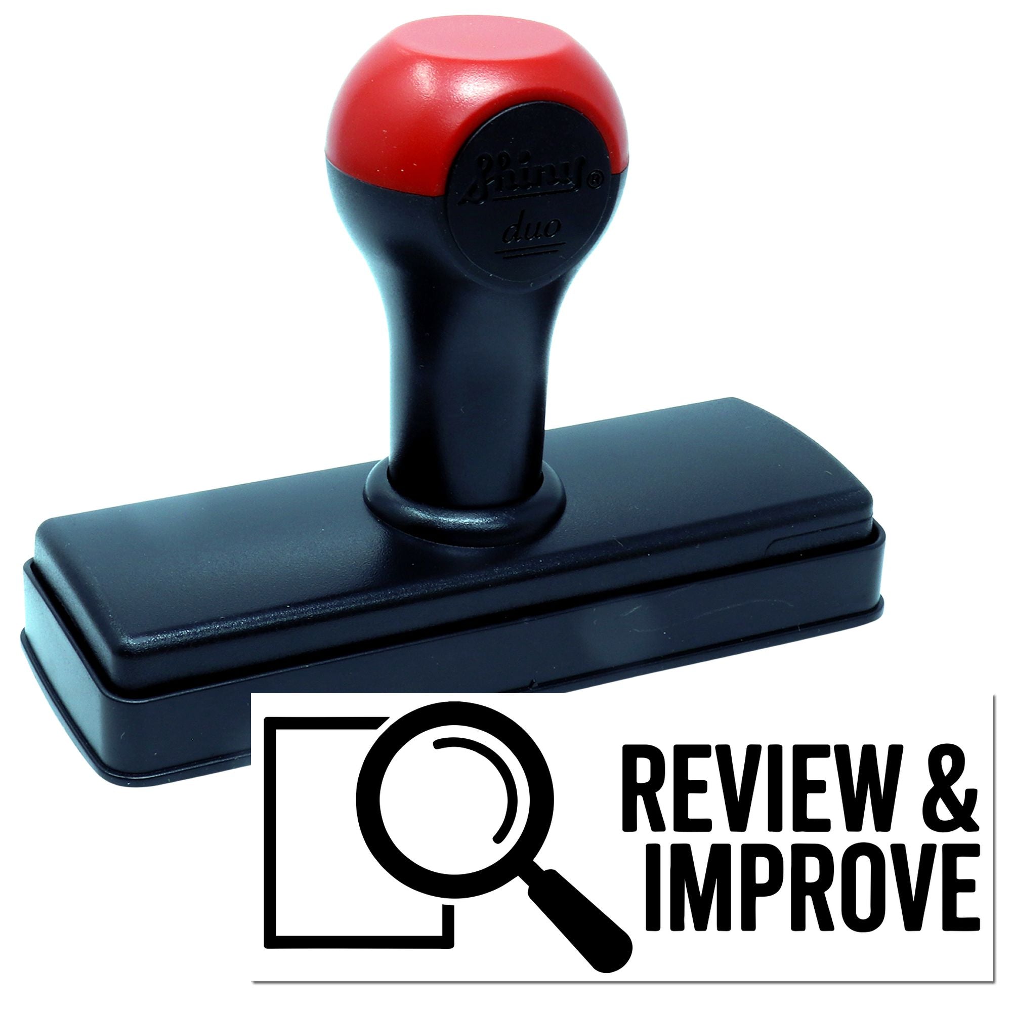 Self-inking rubber stamp with Review & Improve message for quality control, feedback, and office document marking.