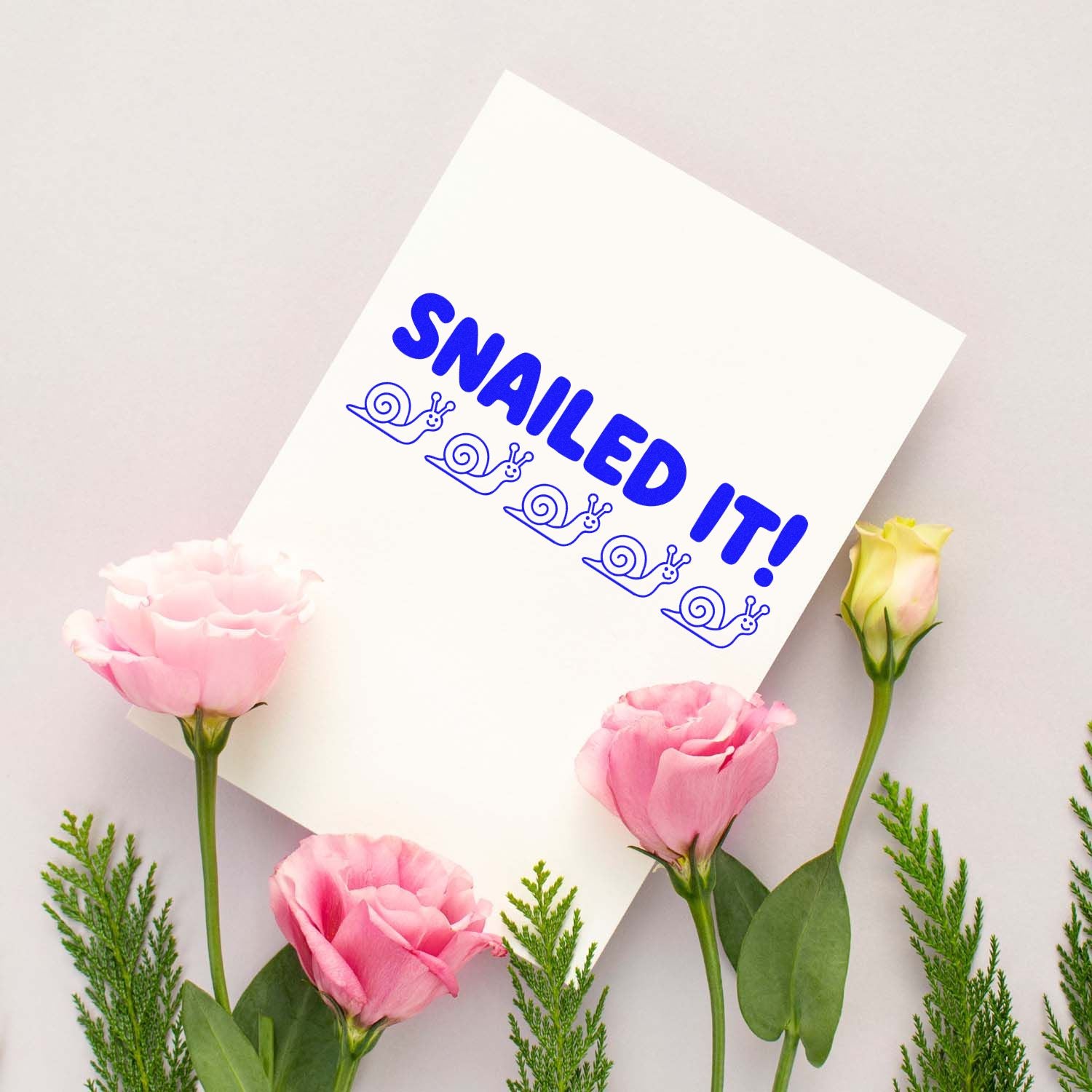 Snail-themed rubber stamp design with SNAILED IT! text, perfect for craft, scrapbook, and celebration projects.