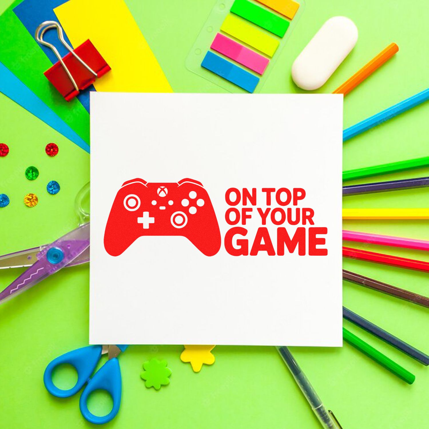 Custom rubber stamp with game controller and On Top of Your Game text for student achievement and reward stamps.