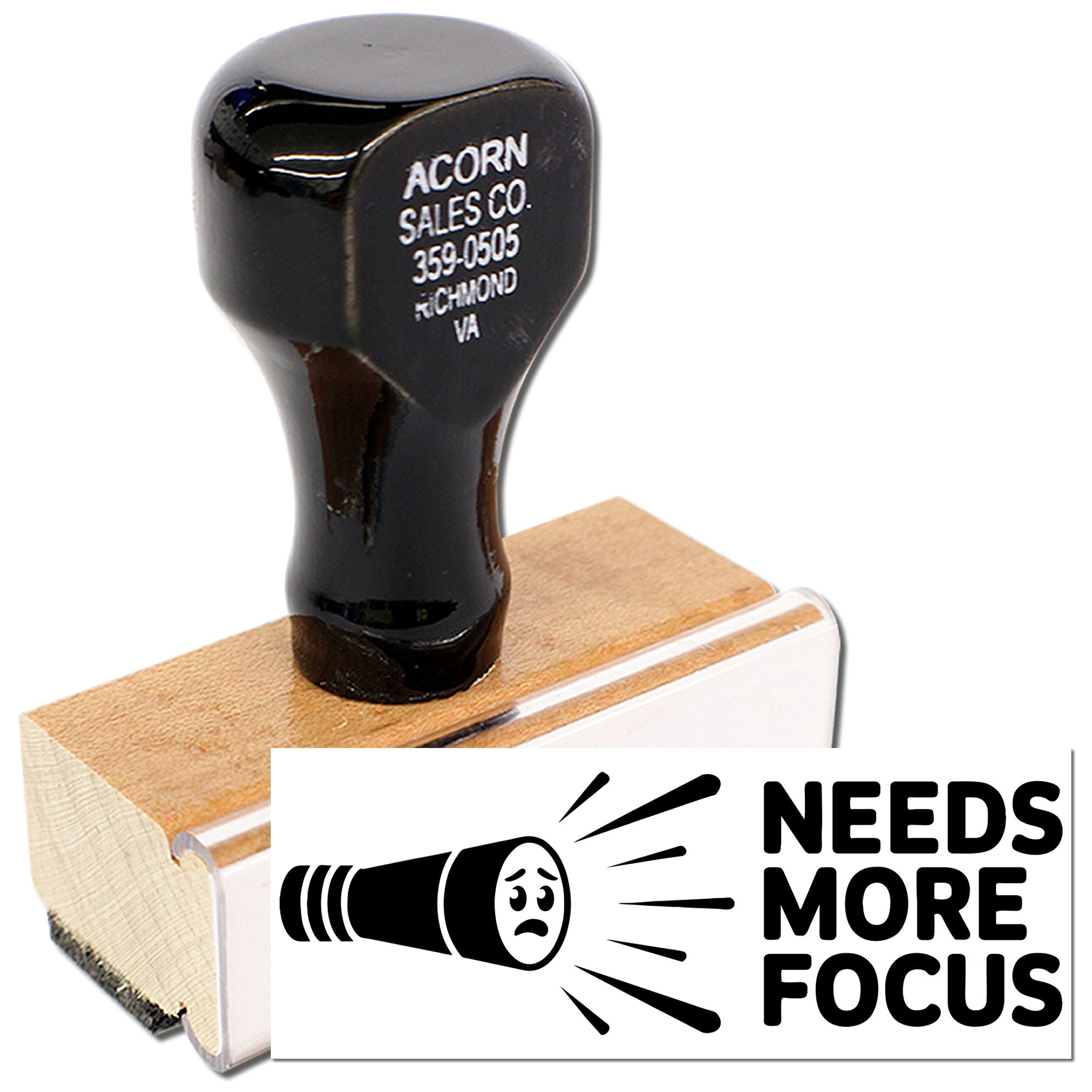 Custom rubber stamp with Needs More Focus design for office humor, branding, and personalized business use.