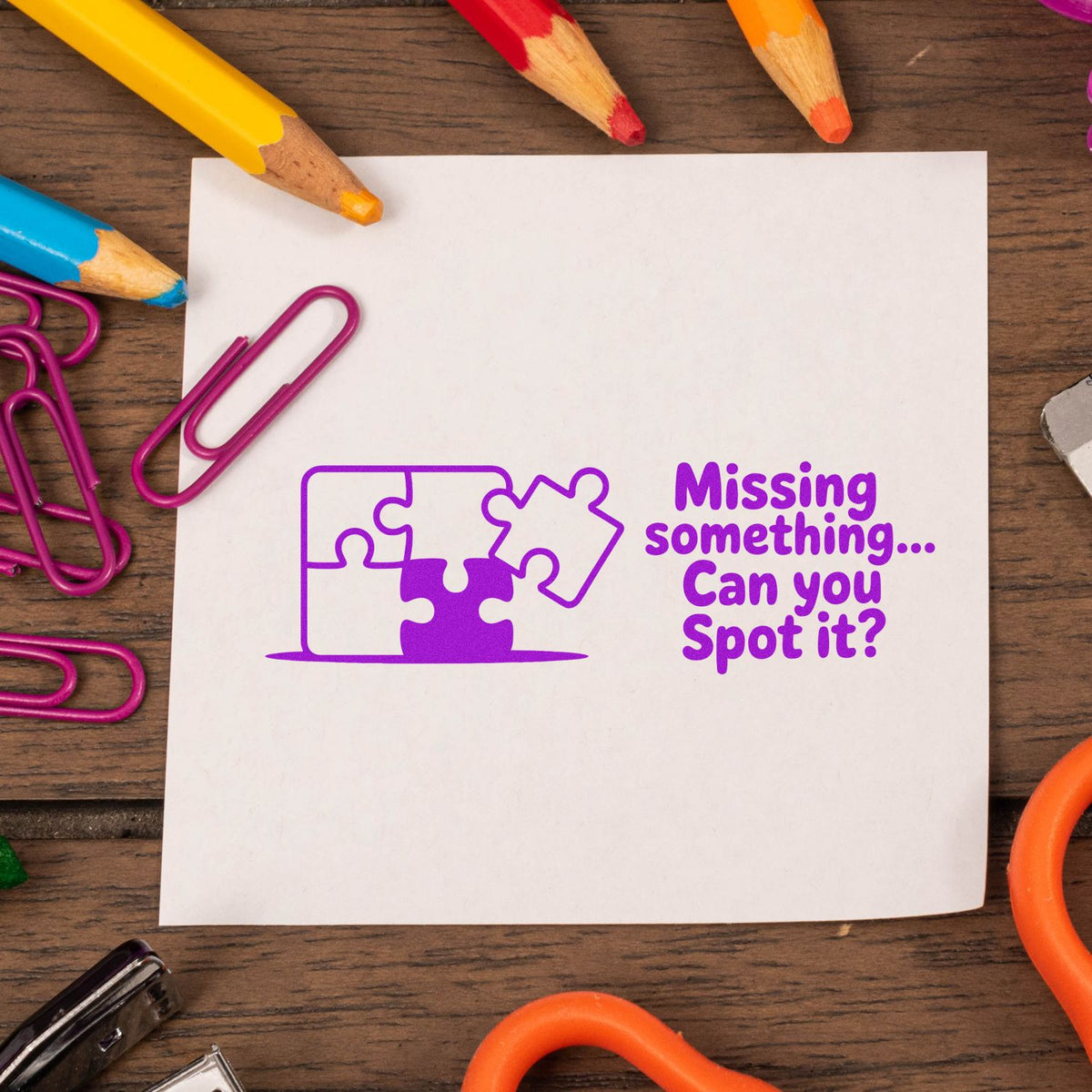 Rubber stamp design with puzzle piece graphic and Missing something Can you spot it? text for craft and stationery projects.