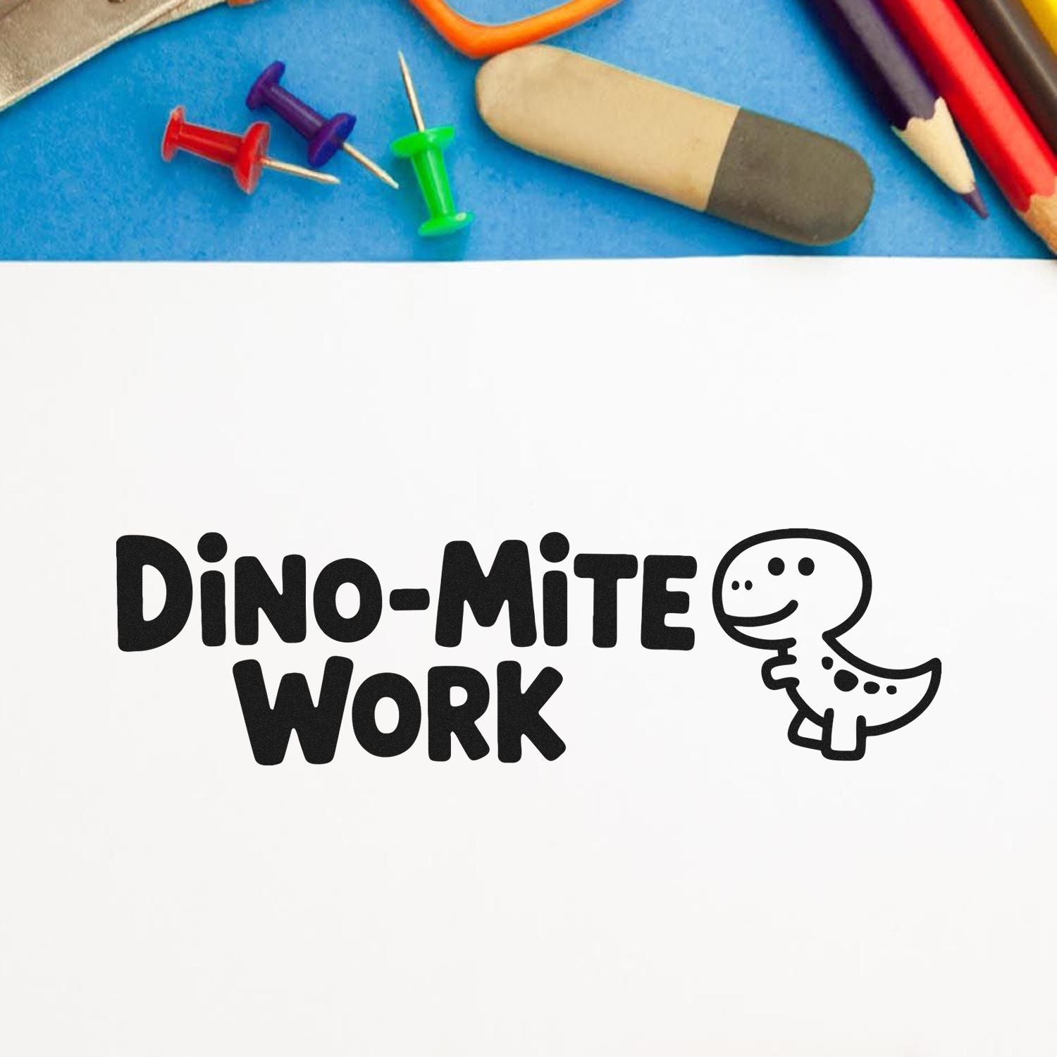 Dino-Mite Work rubber stamp with dinosaur graphic, ideal for teachers, classroom rewards, and craft projects.
