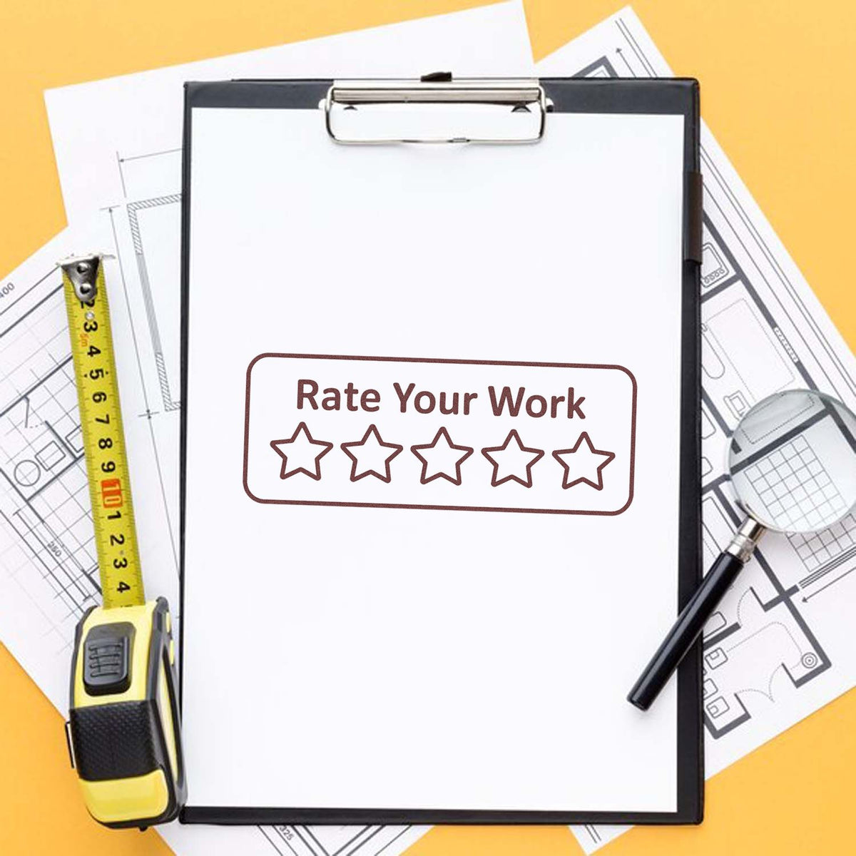 Rubber stamp reading Rate Your Work with five stars on a clipboard for teacher, employee, or quality feedback.