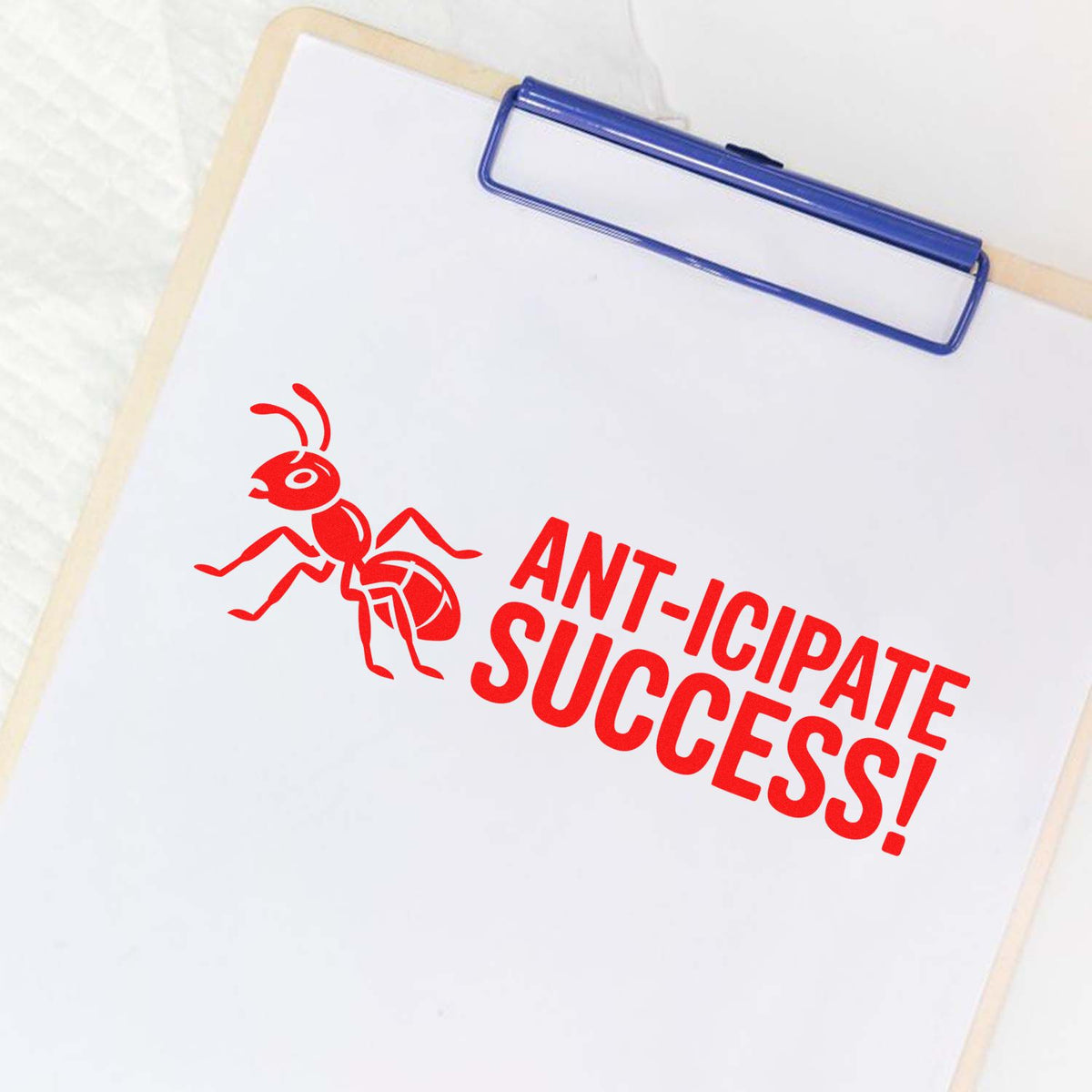 Custom rubber stamp with ant graphic and Ant-icipate Success! text for office, school, or business use.