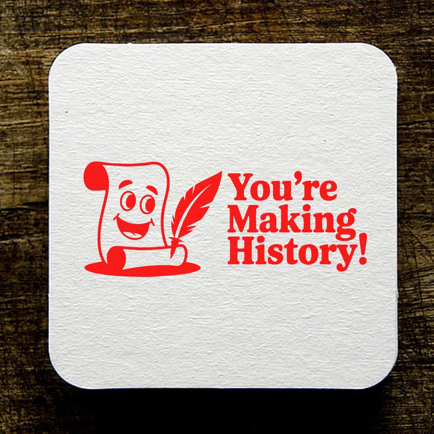 Custom rubber stamp design with scroll and quill icon and Youre Making History! text for teachers, students, and awards.