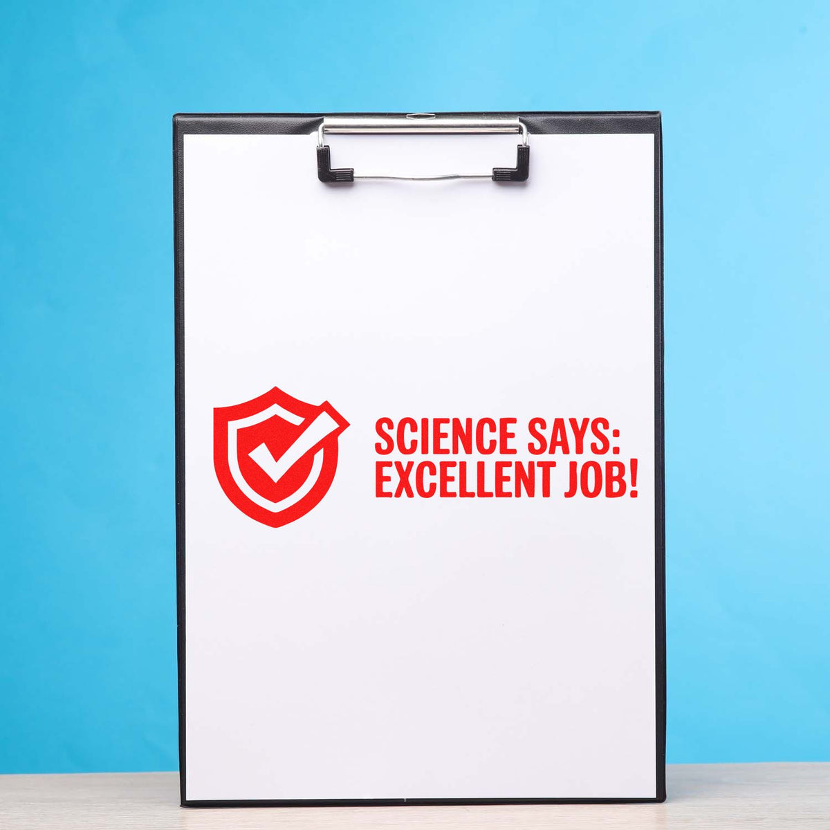 Science Says Excellent Job rubber stamp design on clipboard, ideal for teacher rewards and classroom feedback.