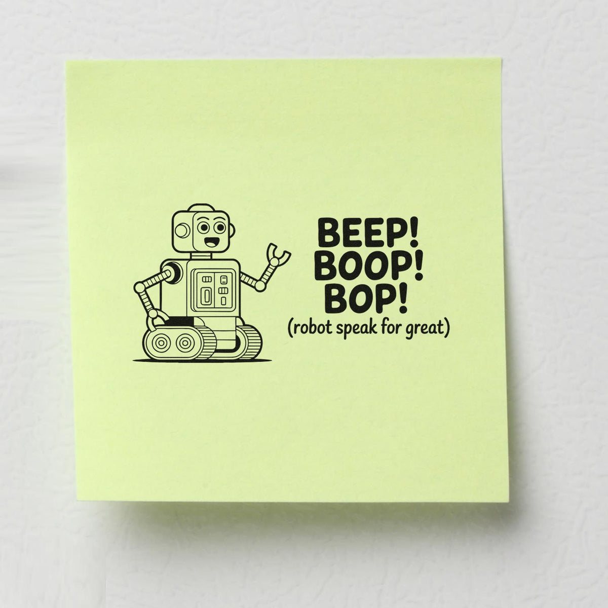 Cute robot rubber stamp impression with BEEP! BOOP! BOP! slogan on a sticky note.