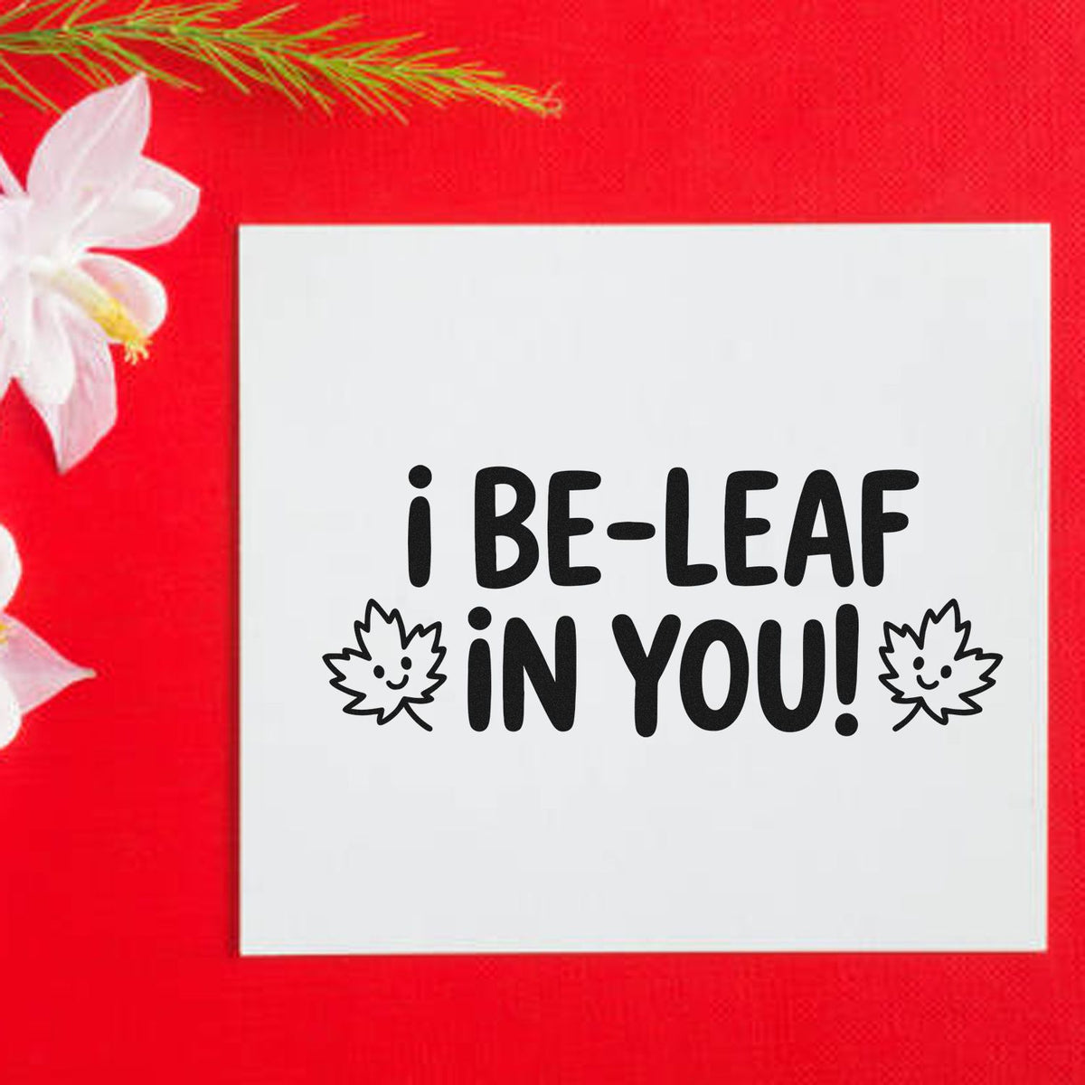 Cute leaf-themed rubber stamp with I be-leaf in you! message for encouraging handmade cards and craft projects.