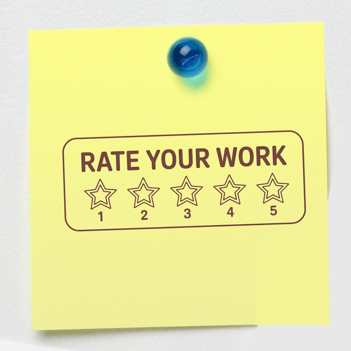 Rubber stamp impression reading Rate Your Work with 15 star rating on a yellow sticky note.