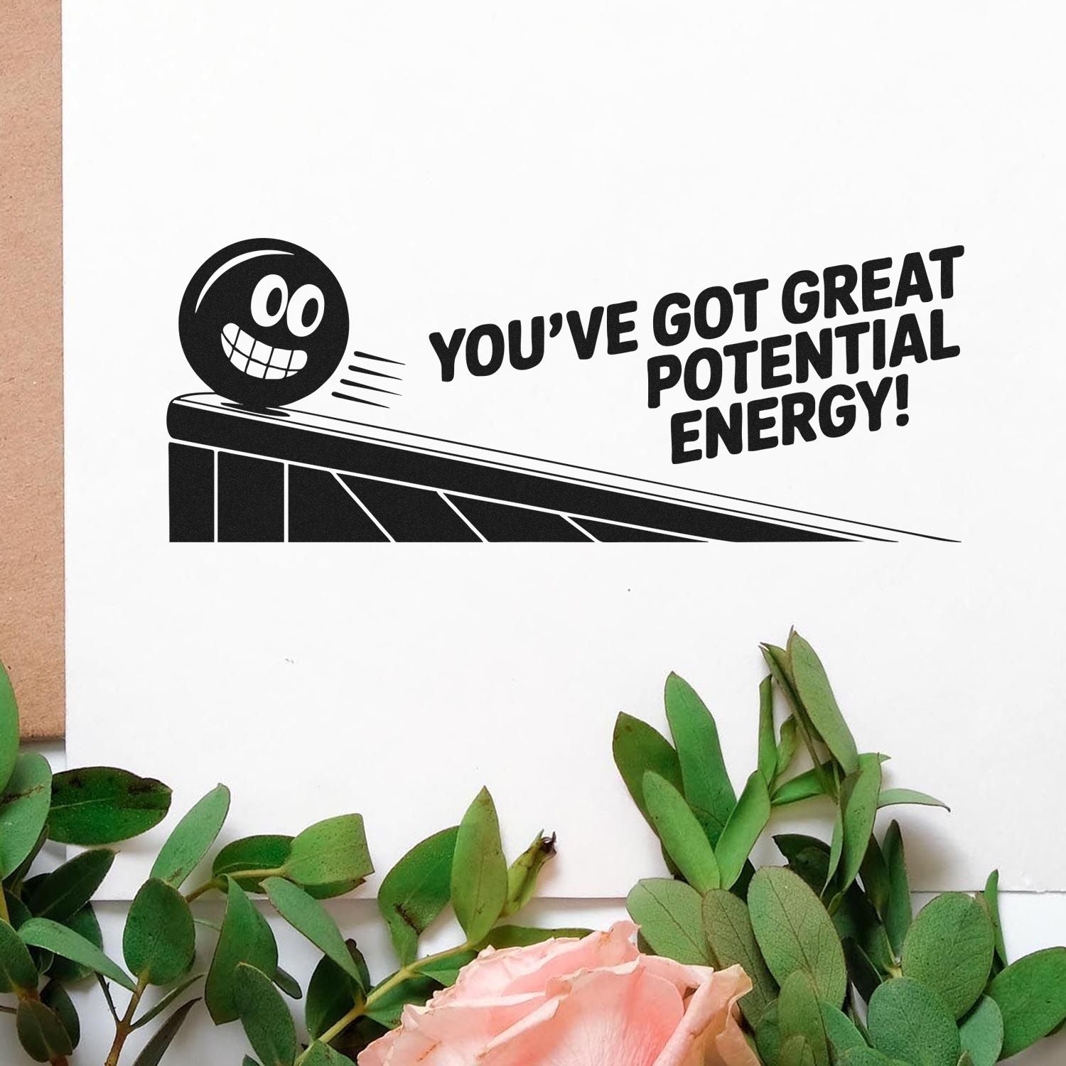 Motivational rubber stamp with smiling ball graphic and text, Youve got great potential energy! for classroom feedback.