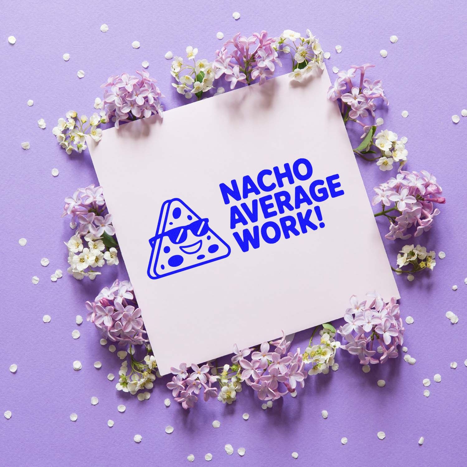 Custom rubber stamp design mockup with Nacho Average Work! taco graphic for fun office or packaging use.