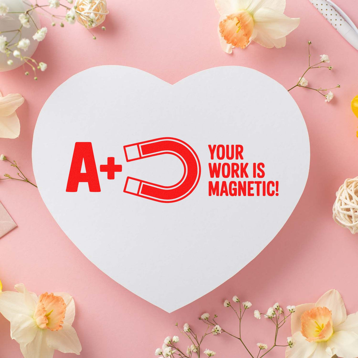Custom rubber stamp design with A+ magnet and Your Work Is Magnetic message, ideal for teacher reward stamps.