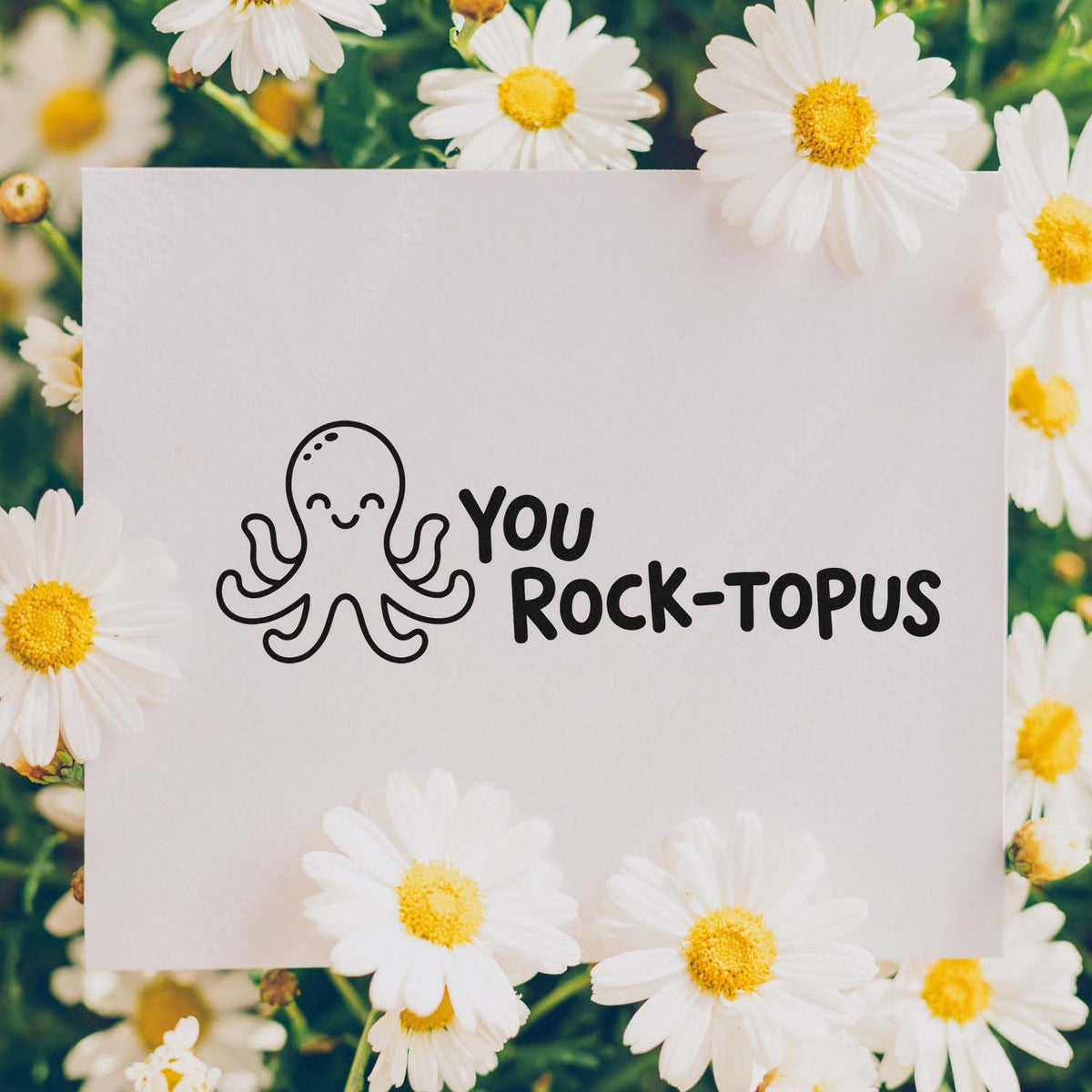 Octopus You Rock-topus rubber stamp design on white paper with daisy flowers, perfect for playful custom stationery.