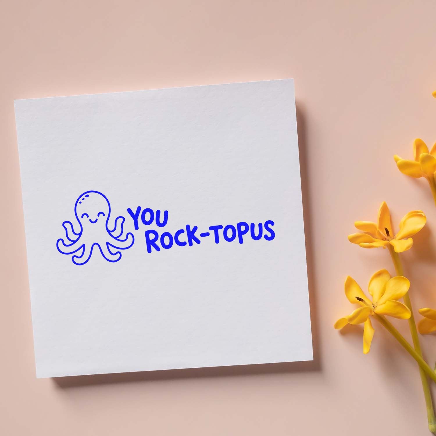 Playful octopus You Rock-topus rubber stamp impression on white card, perfect for custom stationery and gift tags.