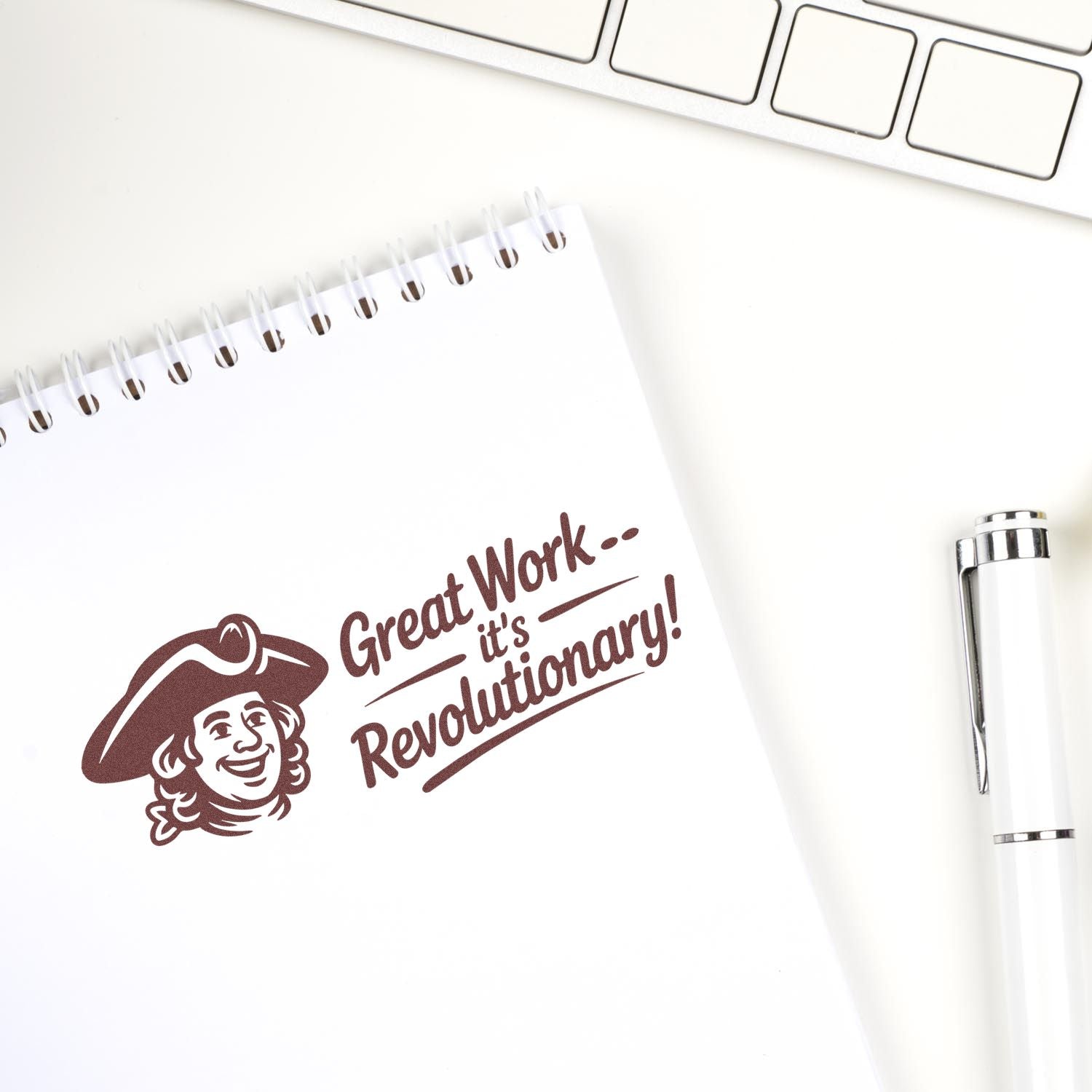 Custom rubber stamp reading Great Work, Its Revolutionary! for teacher, office, or business recognition.