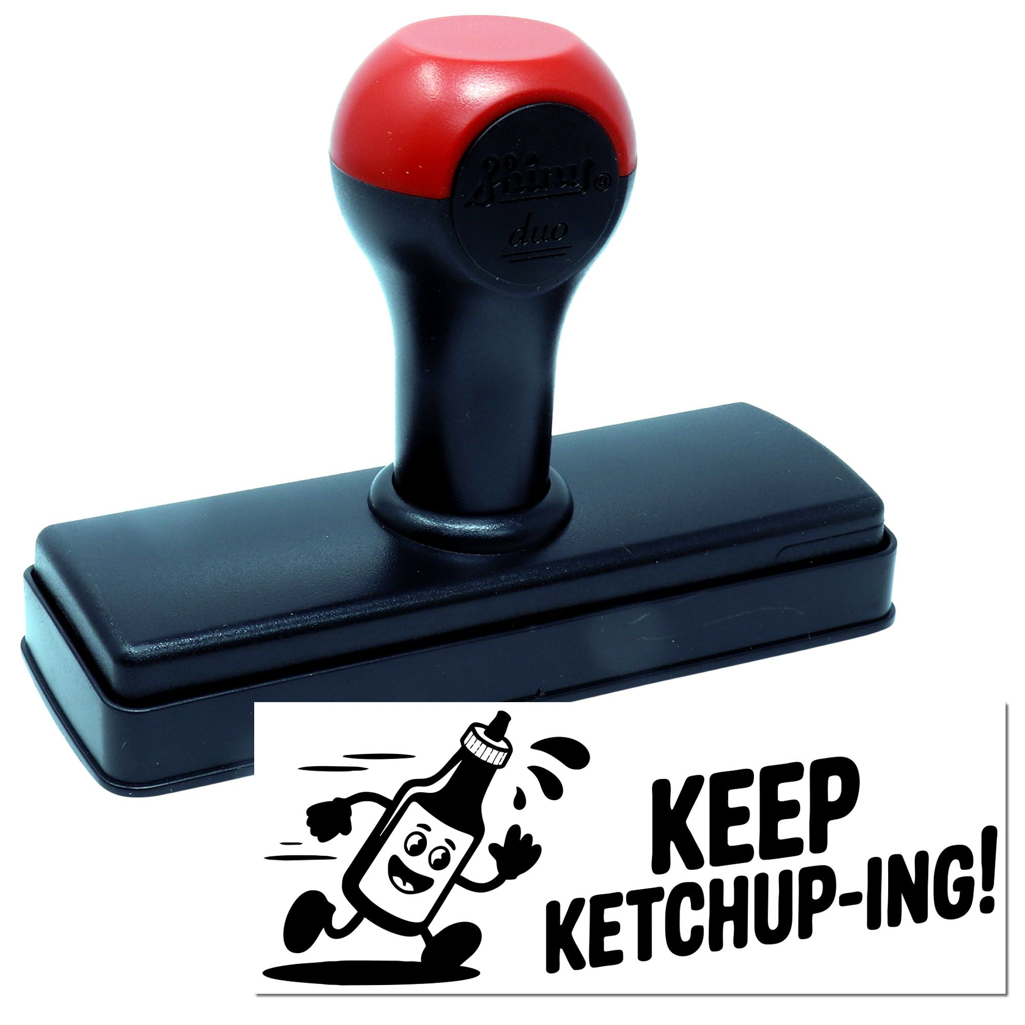 Self-inking rubber stamp with custom Keep Ketchup-ing! ketchup bottle design for food packaging branding.