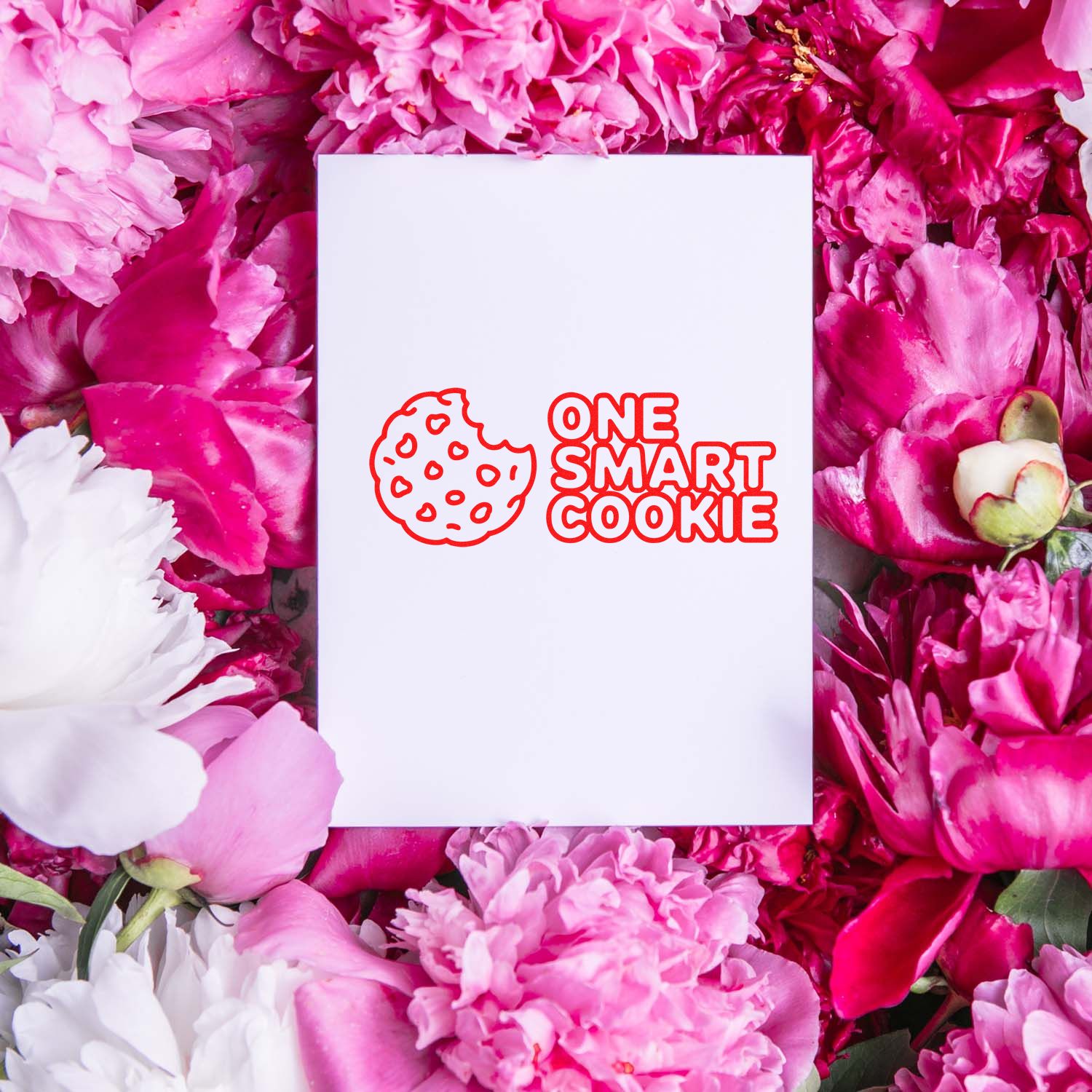 One Smart Cookie rubber stamp design on a blank card, styled with pink flowers for bakery packaging or gift tags.