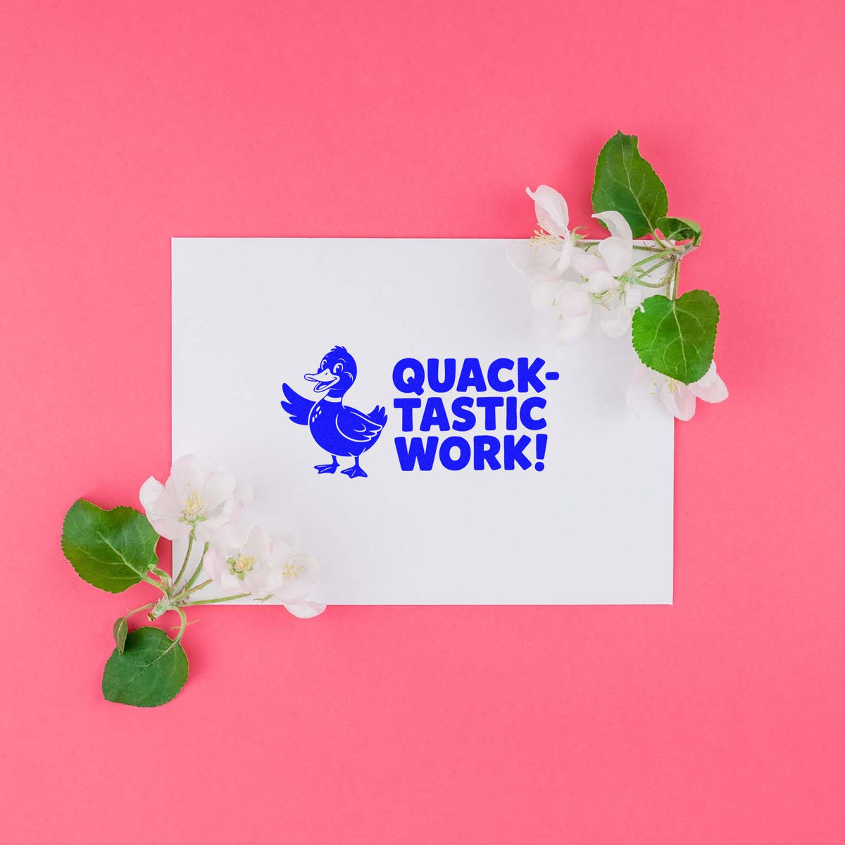 Quack-tastic work rubber stamp design with duck illustration and bold blue praise on a white card with floral accents.
