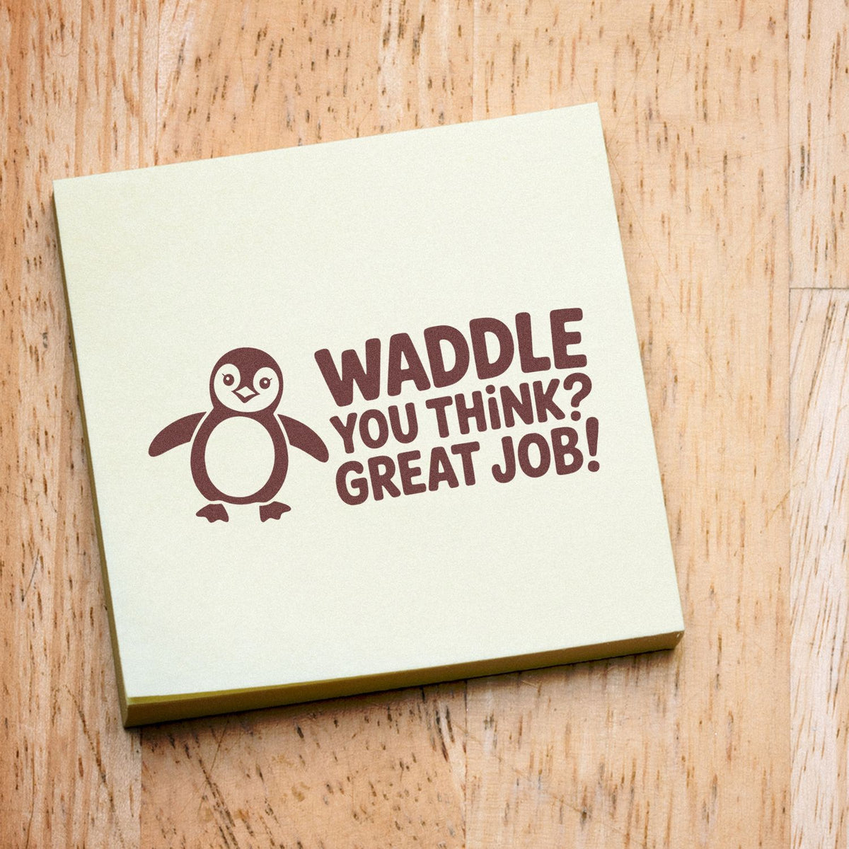 Penguin rubber stamp with Waddle You Think? Great Job! message, ideal for teacher rewards, crafts, and stationery.