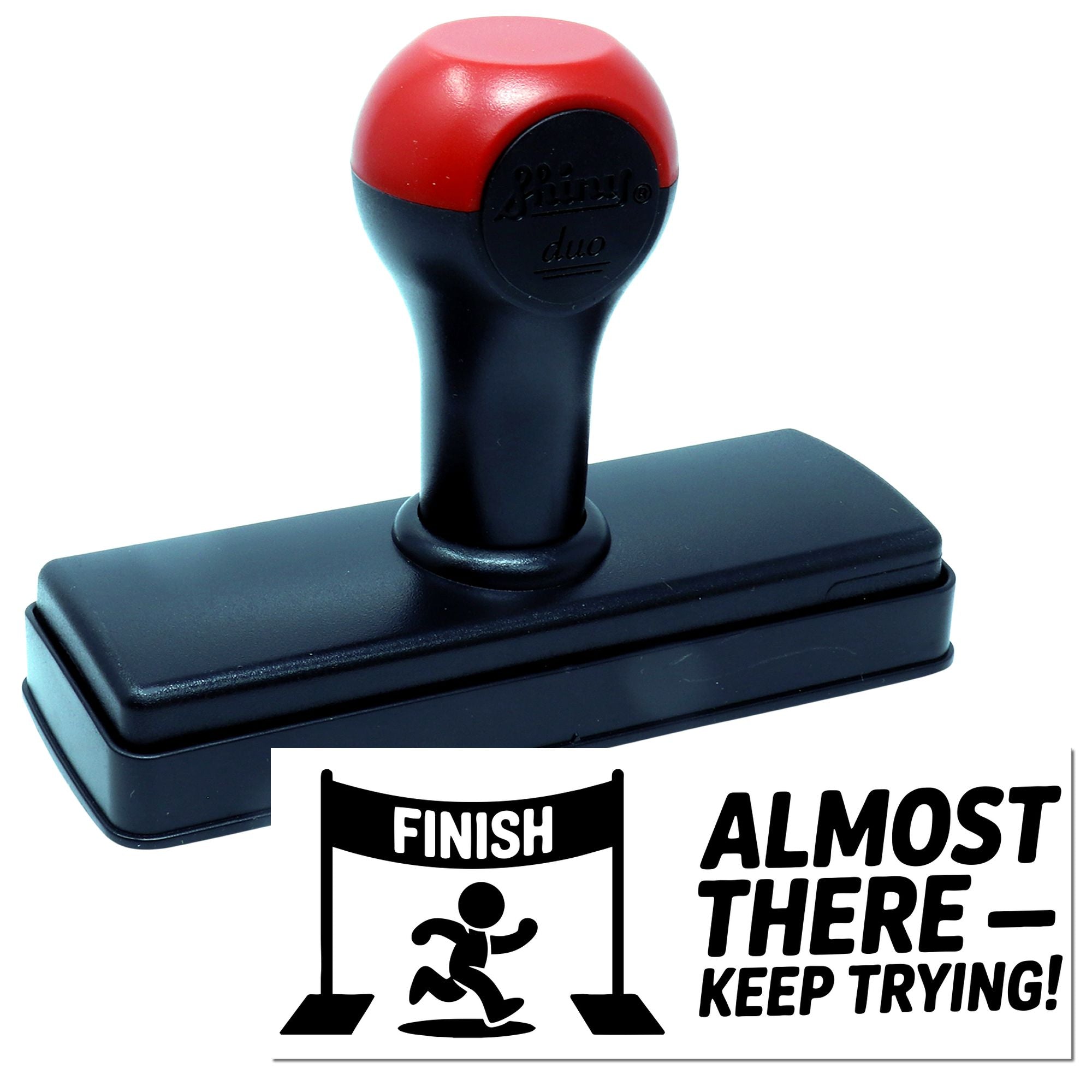 Self-inking rubber stamp with finish line runner design and Almost ThereKeep Trying! motivational message