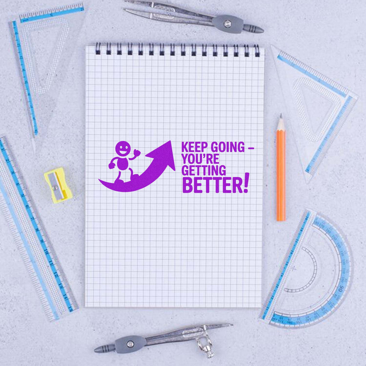 Motivational rubber stamp reading Keep going - youre getting better! for schoolwork, journaling, and encouragement.