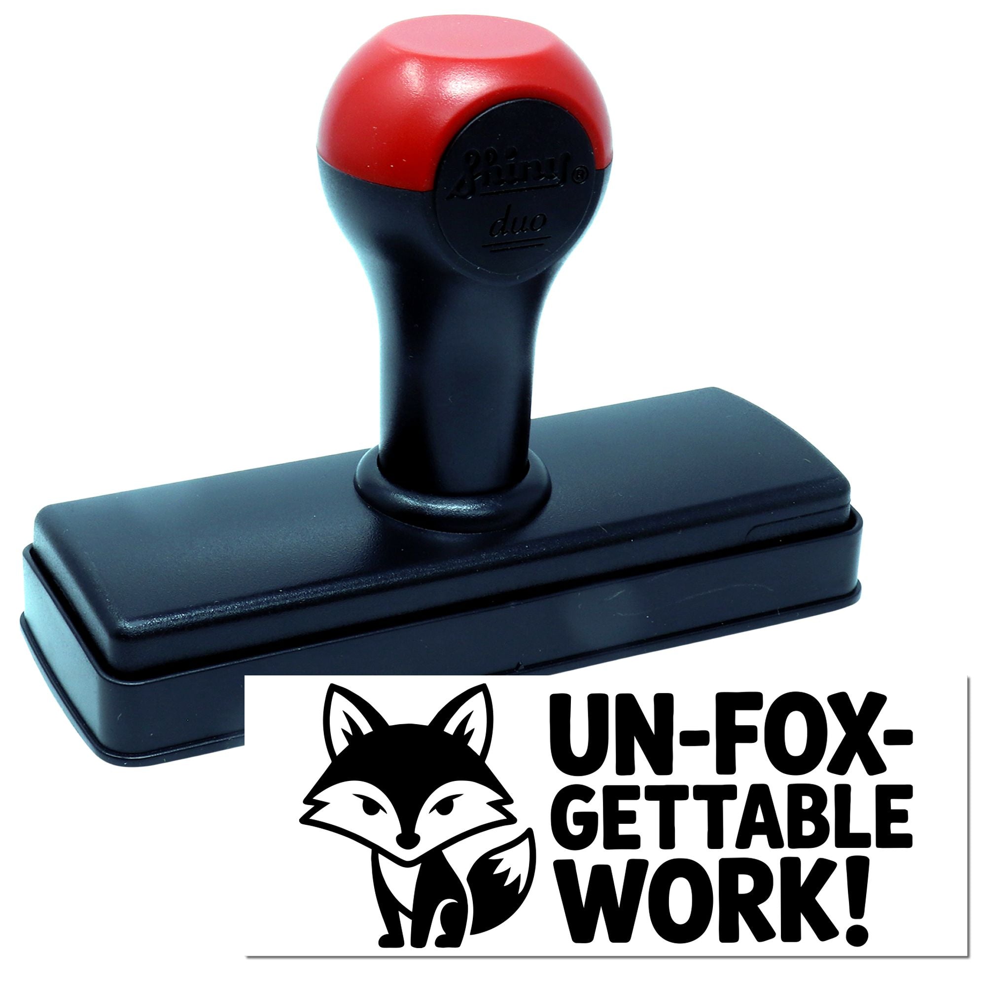 Custom self-inking rubber stamp with fox logo and UN-FOX-GETTABLE WORK! imprint for office branding.