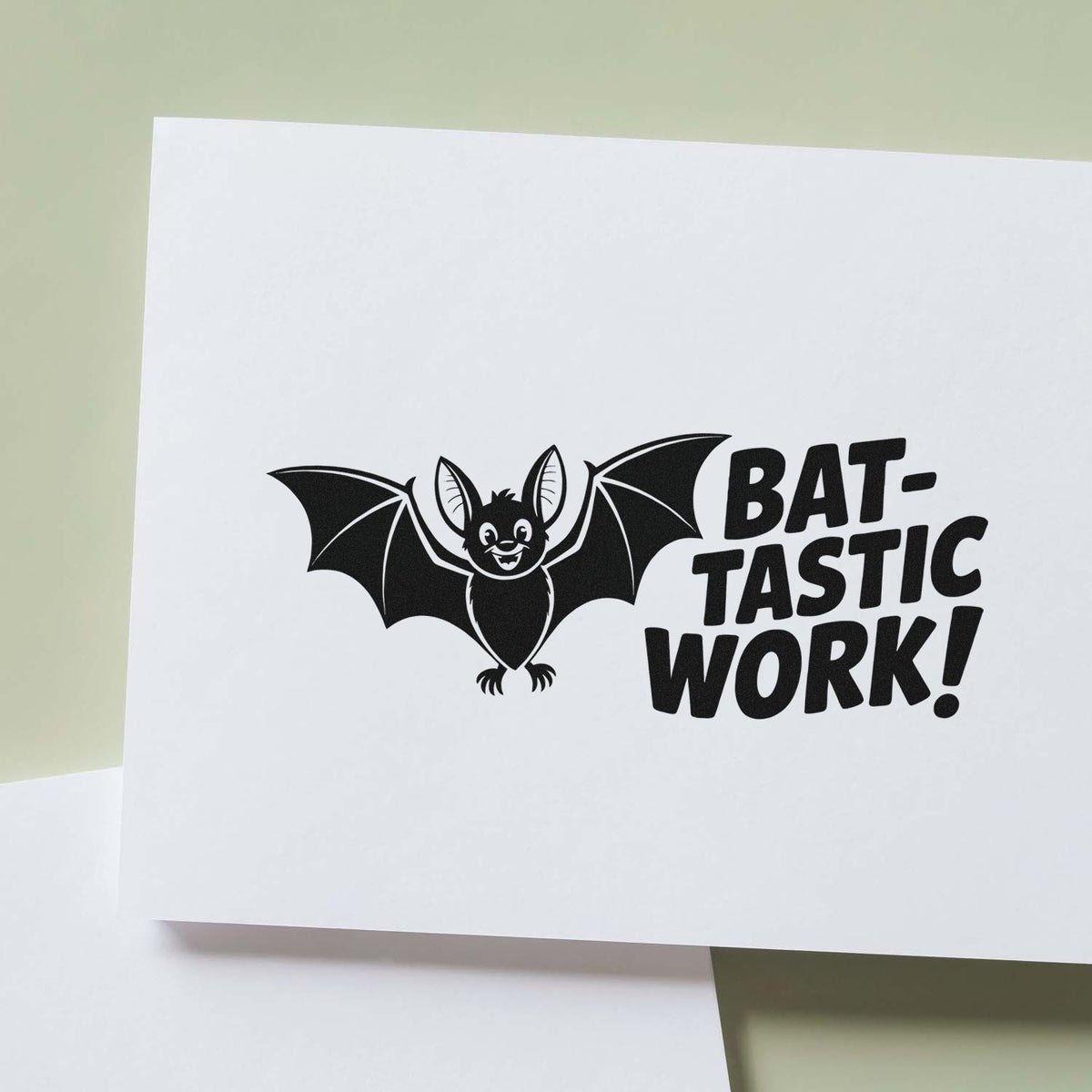 Custom rubber stamp design with playful bat and Bat-tastic Work! text for classroom or craft use.