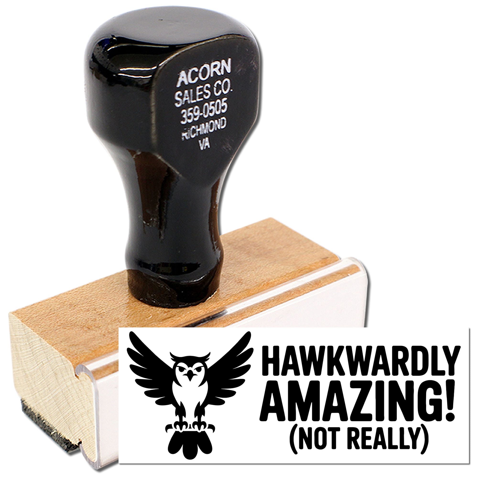 Funny owl rubber stamp with HAWKWARDLY AMAZING! (NOT REALLY) imprint on a wooden stamp block.