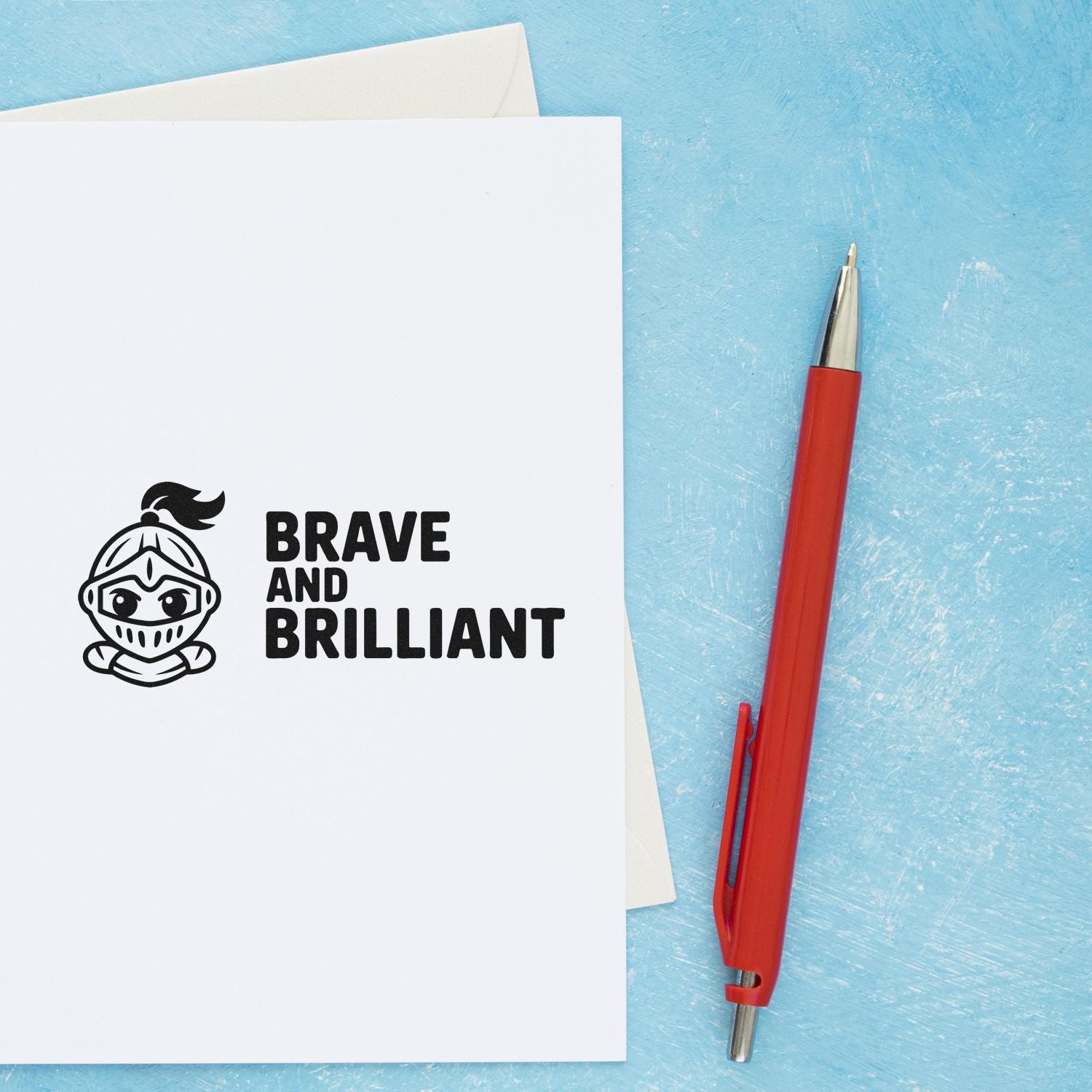 Brave and Brilliant rubber stamp on white card with red pen, ideal for inspirational handmade cards and teacher stationery.