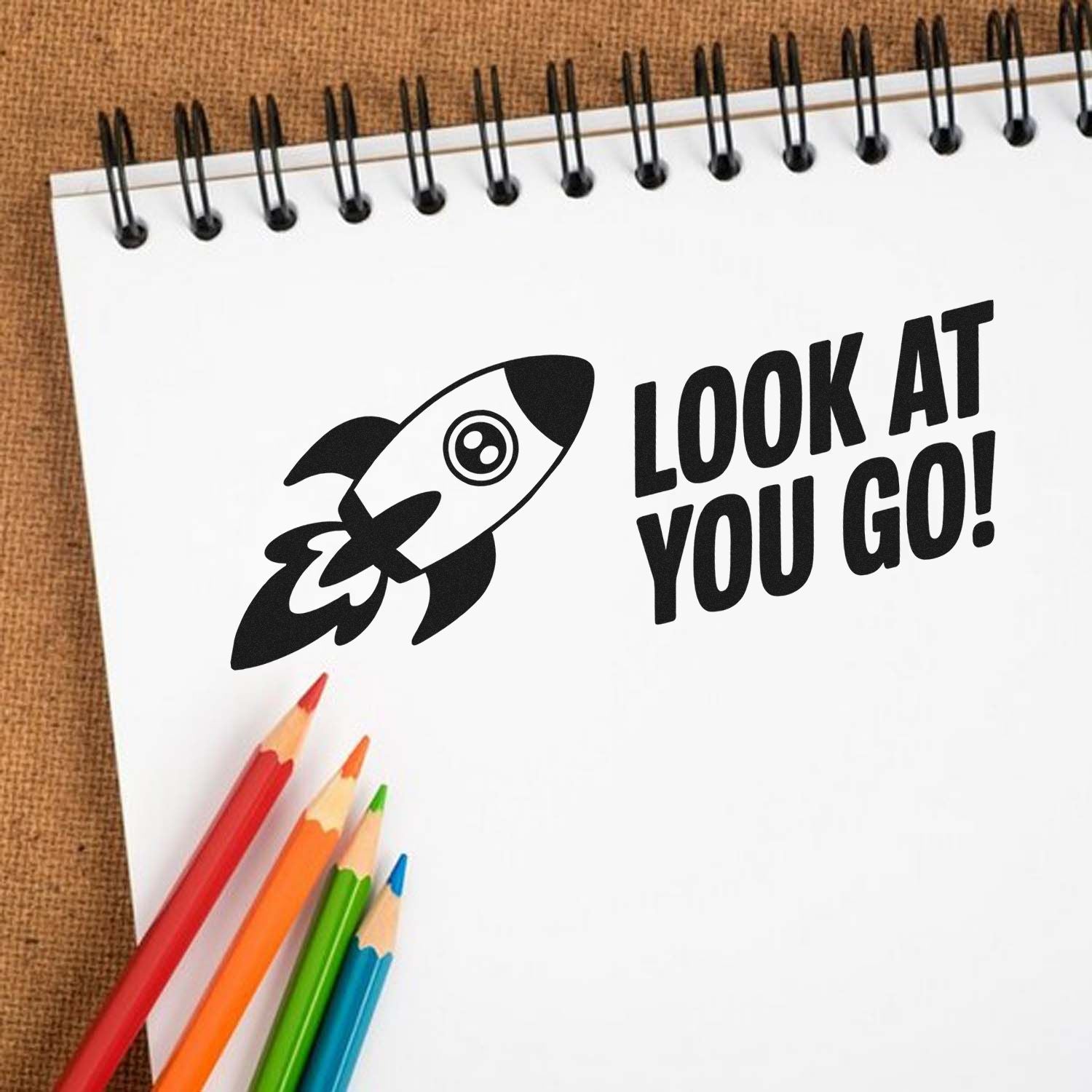 Custom rubber stamp with rocket and Look at You Go! text for motivational rewards, teacher notes, and office use.