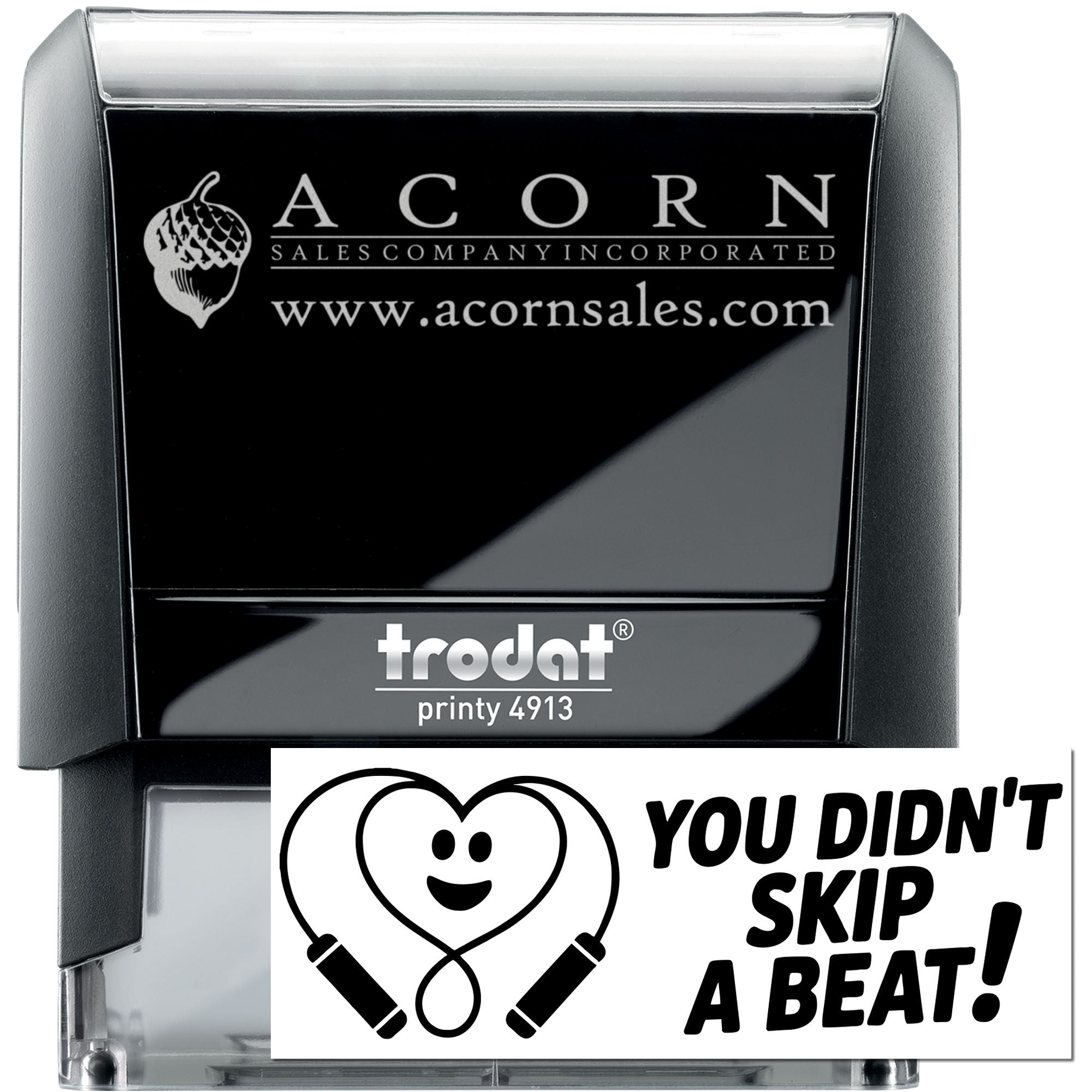 Custom self-inking rubber stamp with Acorn Sales logo and website, plus a funny You Didnt Skip a Beat! stamp design.