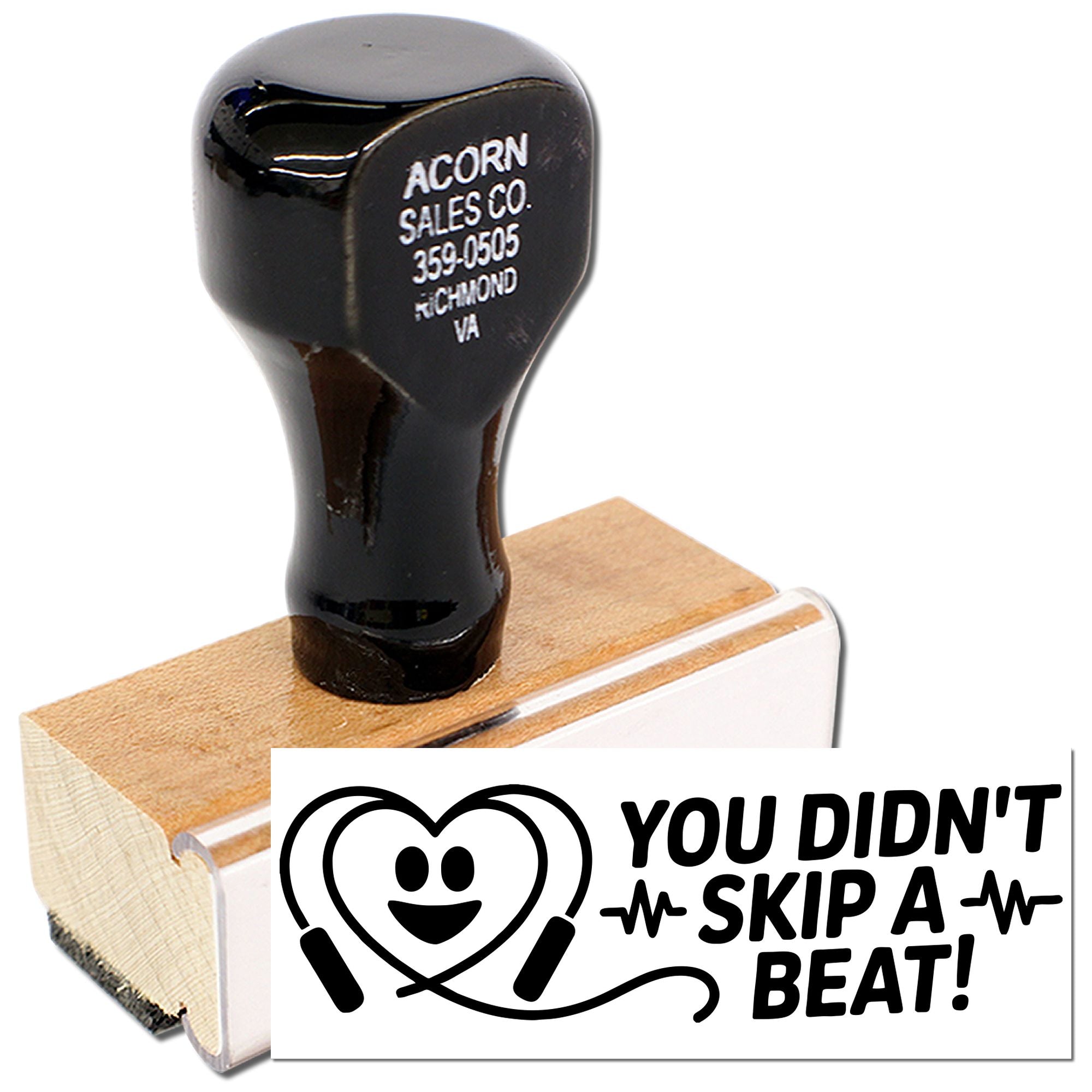 Wood handle custom rubber stamp with You Didnt Skip a Beat! imprint for packaging, branding, or promotions.