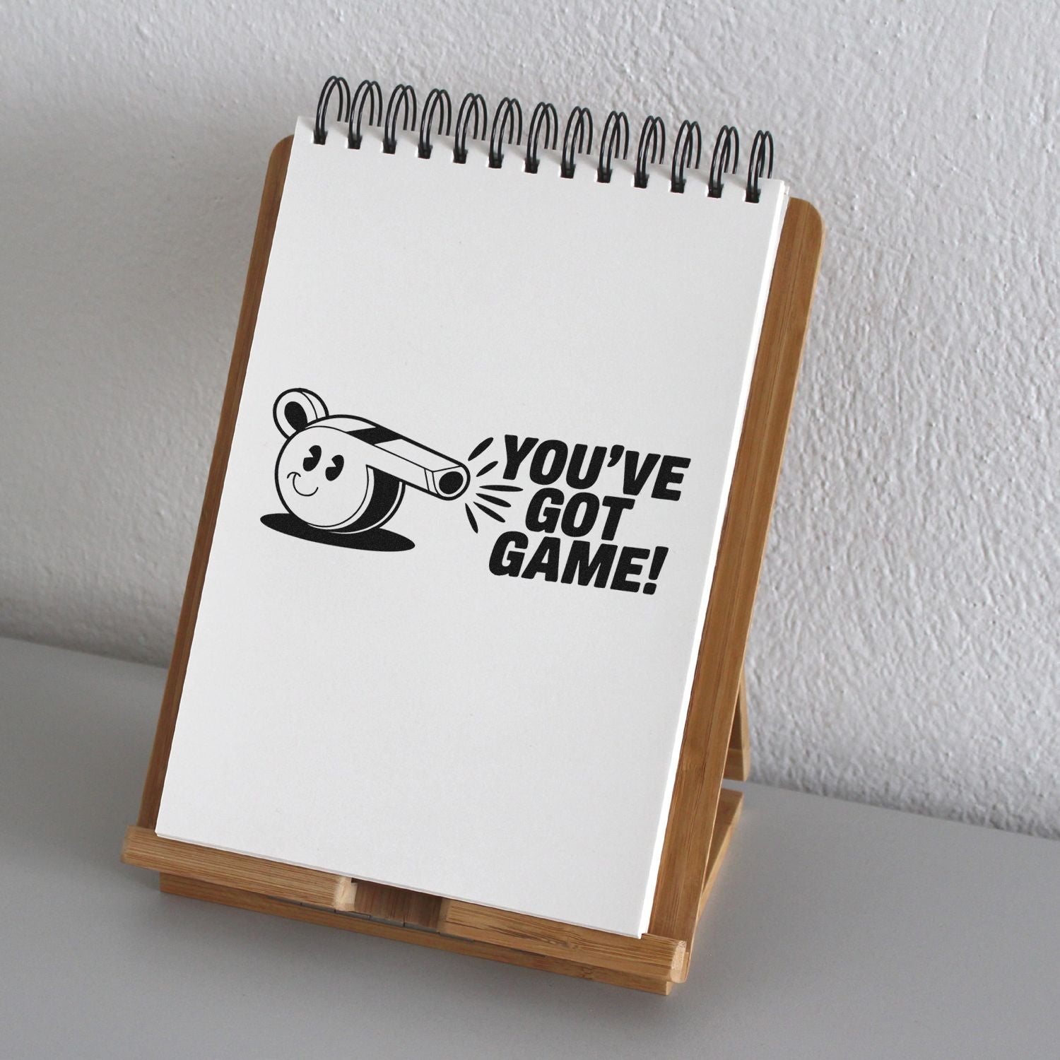 Rubber stamp design with Youve Got Game! and cue ball graphic, ideal for game night, sports, or achievement messages.