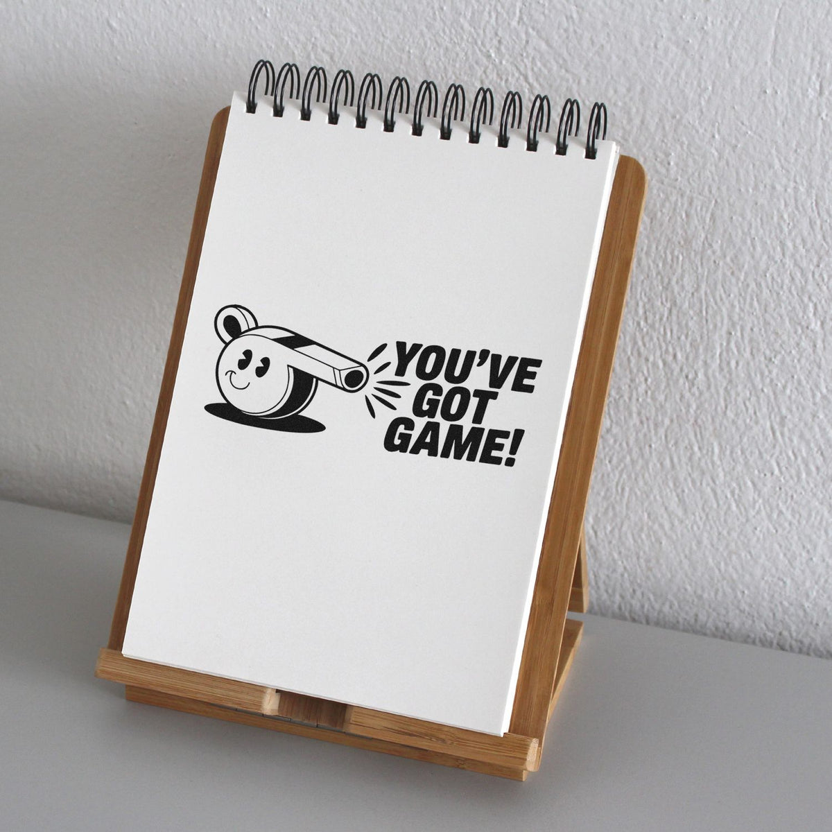Sports rubber stamp design reading Youve Got Game! with whistle graphic, ideal for coaching, awards, and game-day crafts.