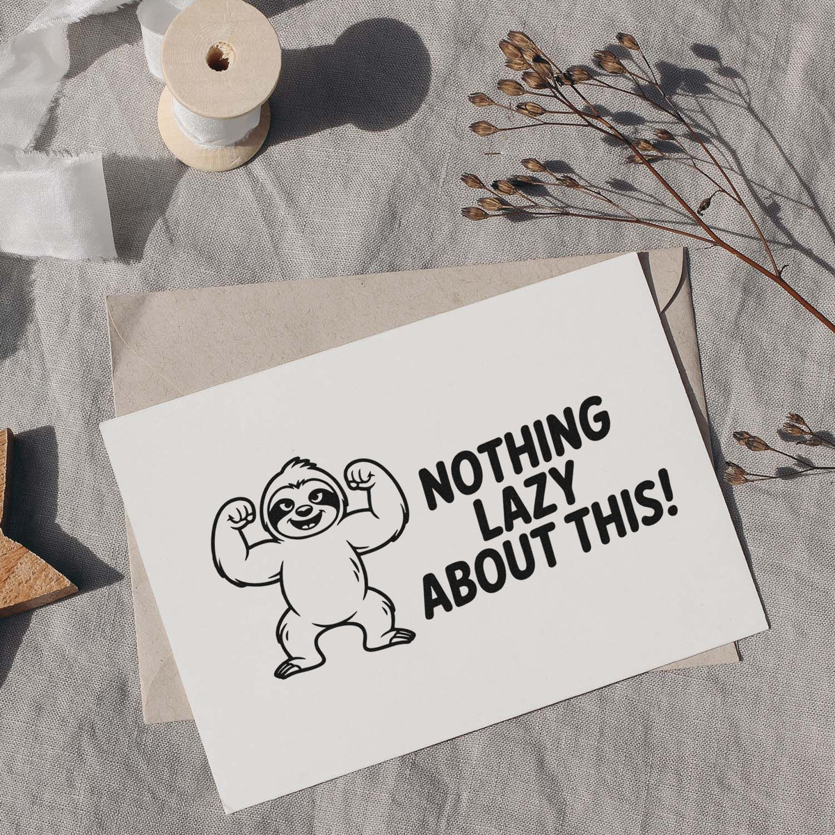 Sloth rubber stamp design with Nothing Lazy About This! text on handmade greeting card stationery.