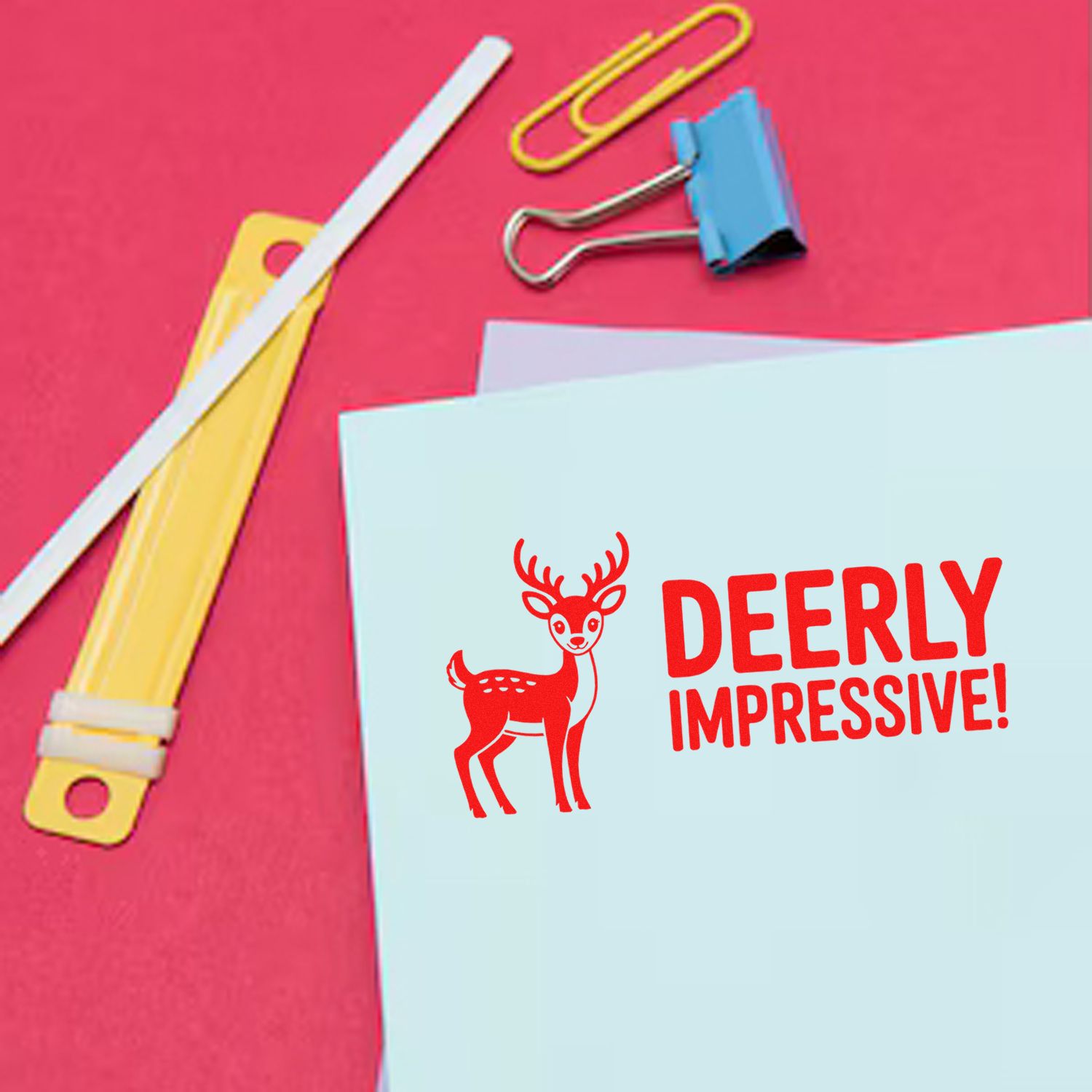 Deerly Impressive rubber stamp on a greeting card, styled with stationery supplies for handmade card making and crafting.