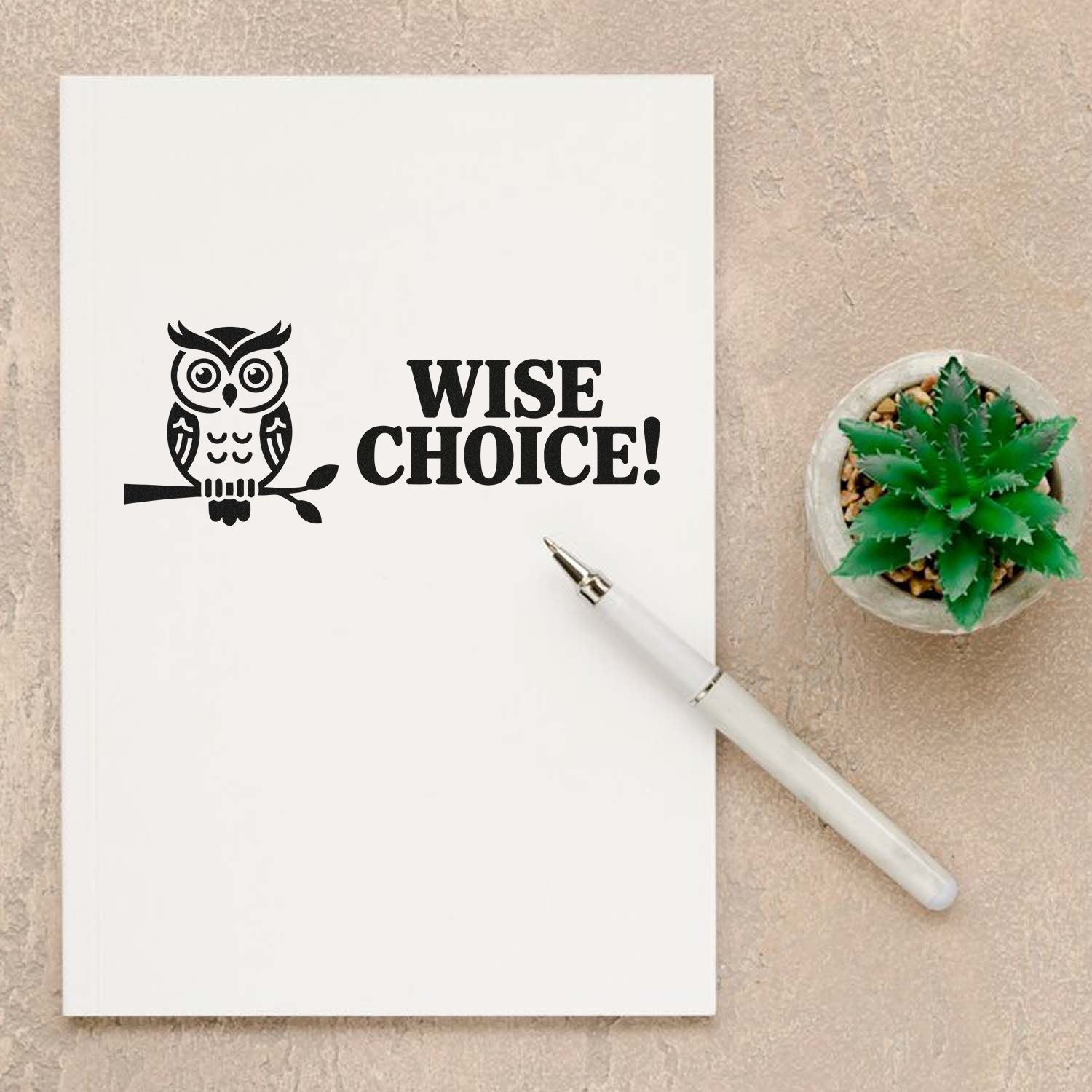 Owl rubber stamp design with Wise Choice! text on notebook, ideal for journaling, cards, and craft stamping.