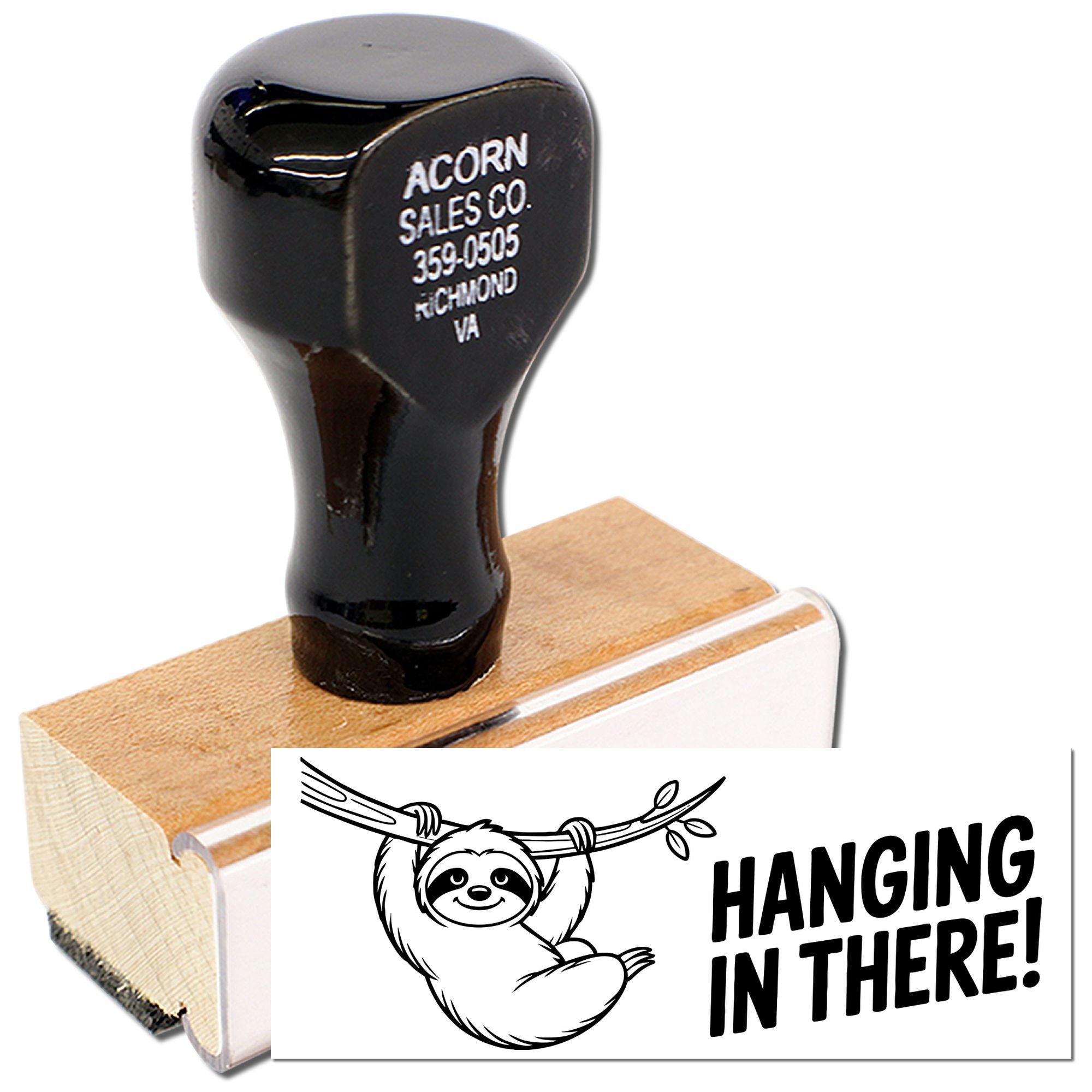 Custom rubber stamp with wooden handle and sloth Hanging in There! design for crafts and packaging.