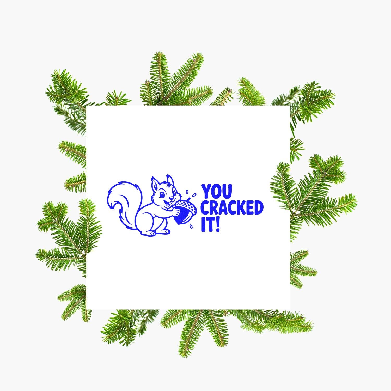 You Cracked It squirrel rubber stamp design with acorn and evergreen branch border for holiday cards.