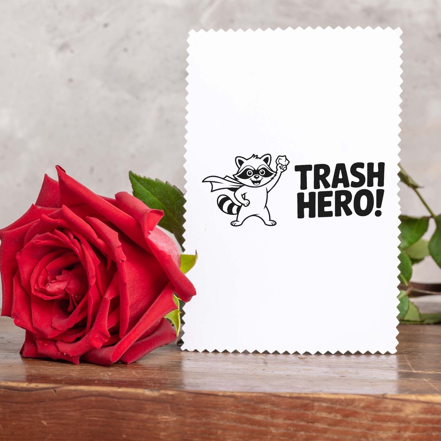 Trash Hero raccoon rubber stamp design on greeting card, perfect for eco-friendly handmade cards and paper crafting.