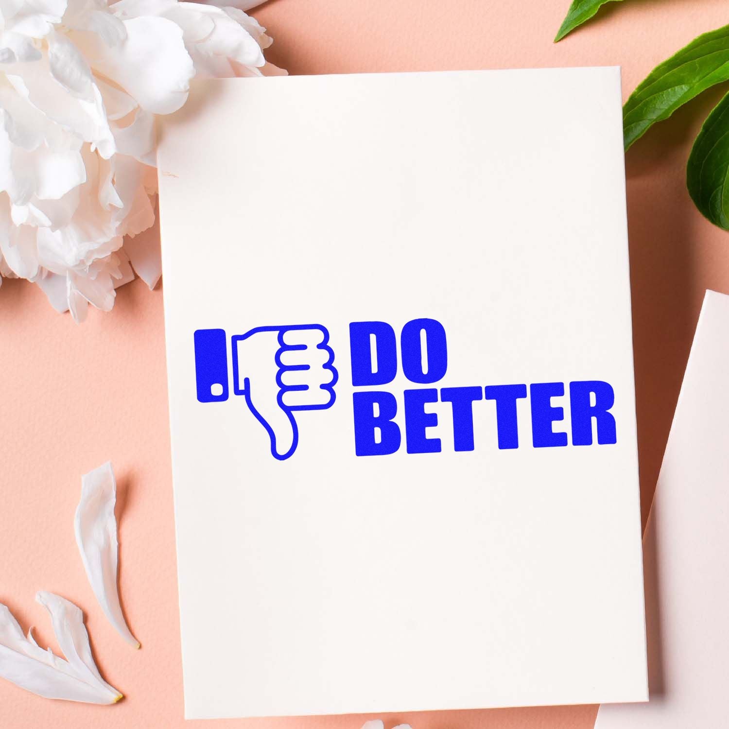 Do Better thumbs-down rubber stamp impression on paper for motivational office, planner, or craft use.