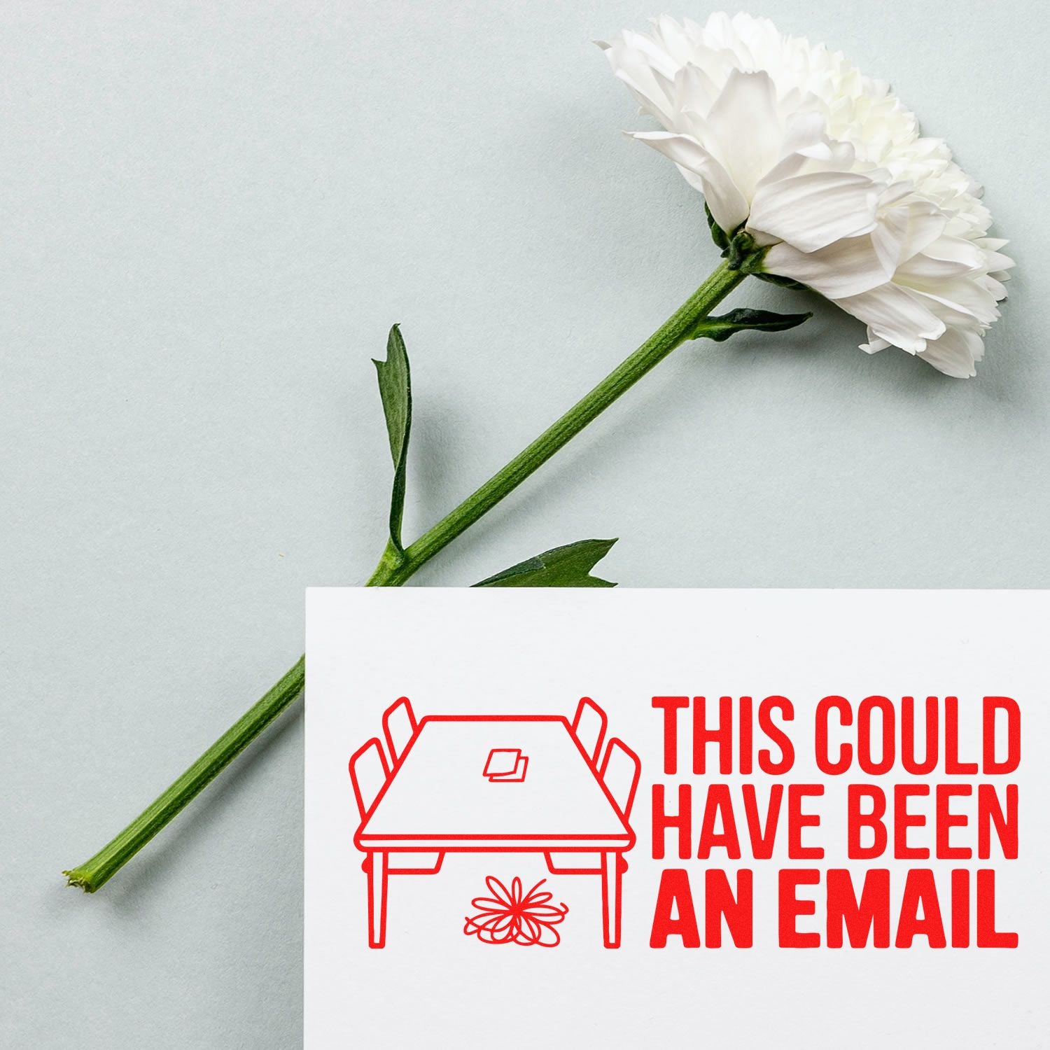 Custom office rubber stamp design reading This Could Have Been an Email in red on a white card.